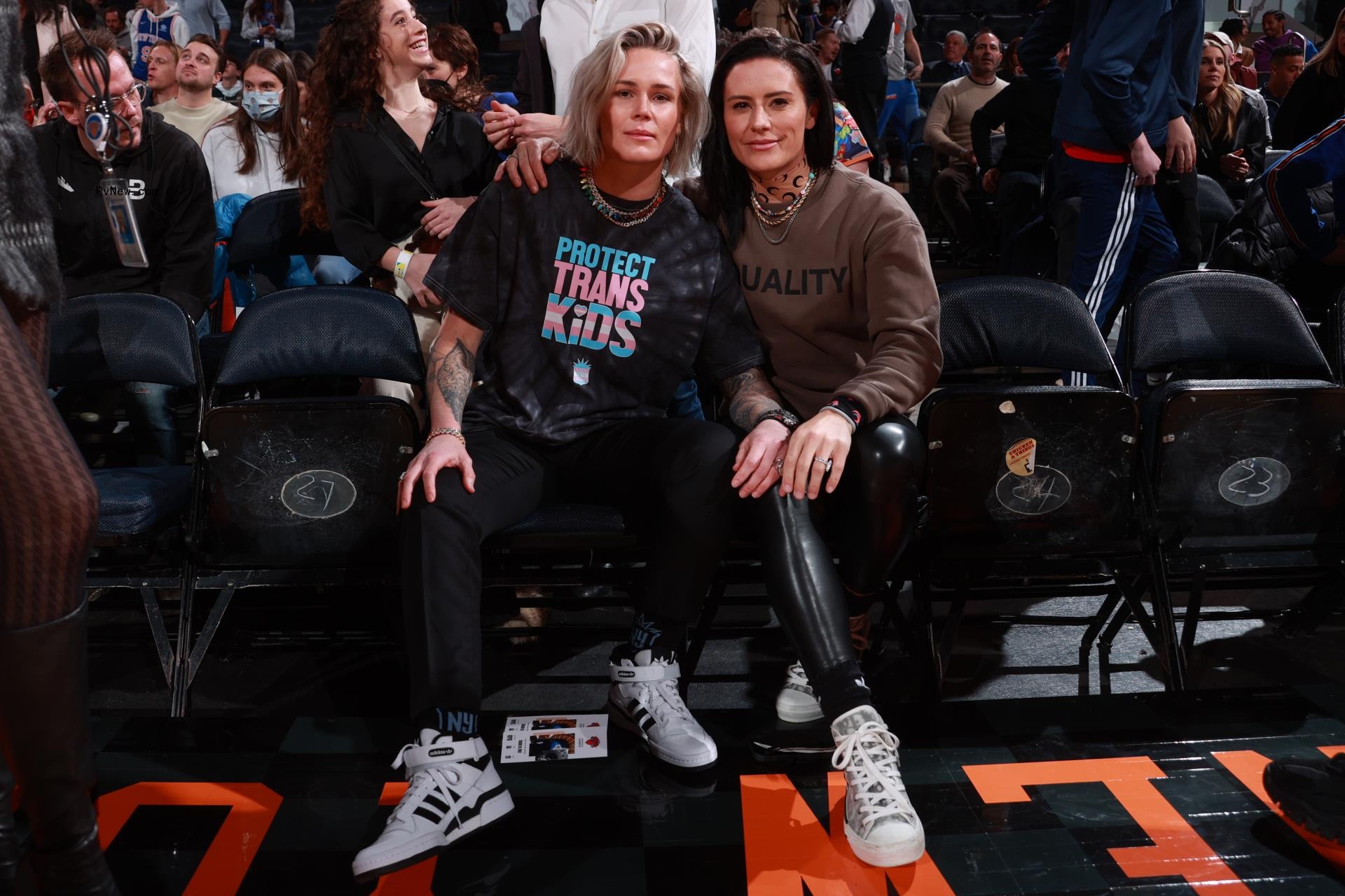 Ashlyn Harris and Ali Krieger posing together 