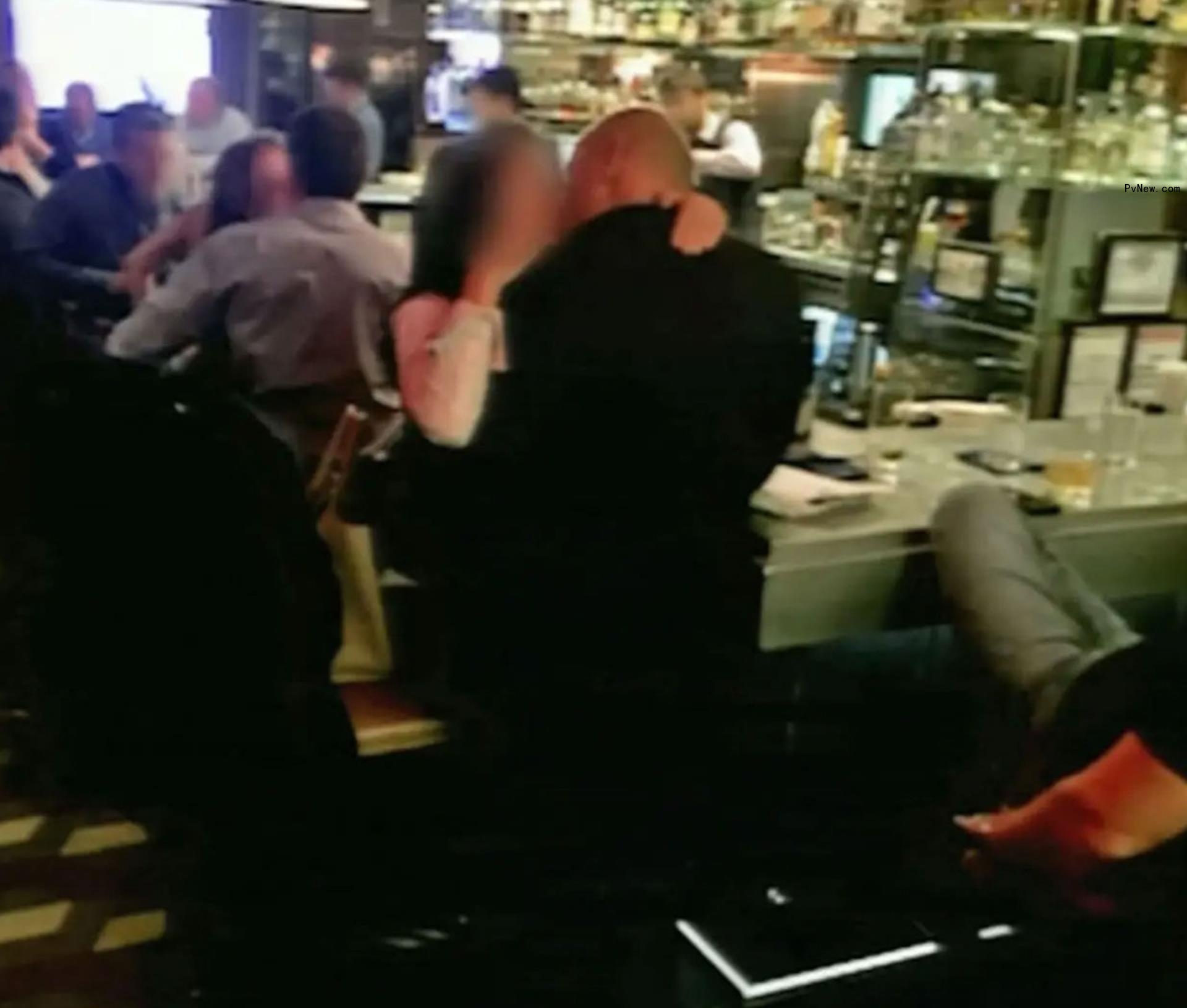 Tom D'Agostino kissing someone