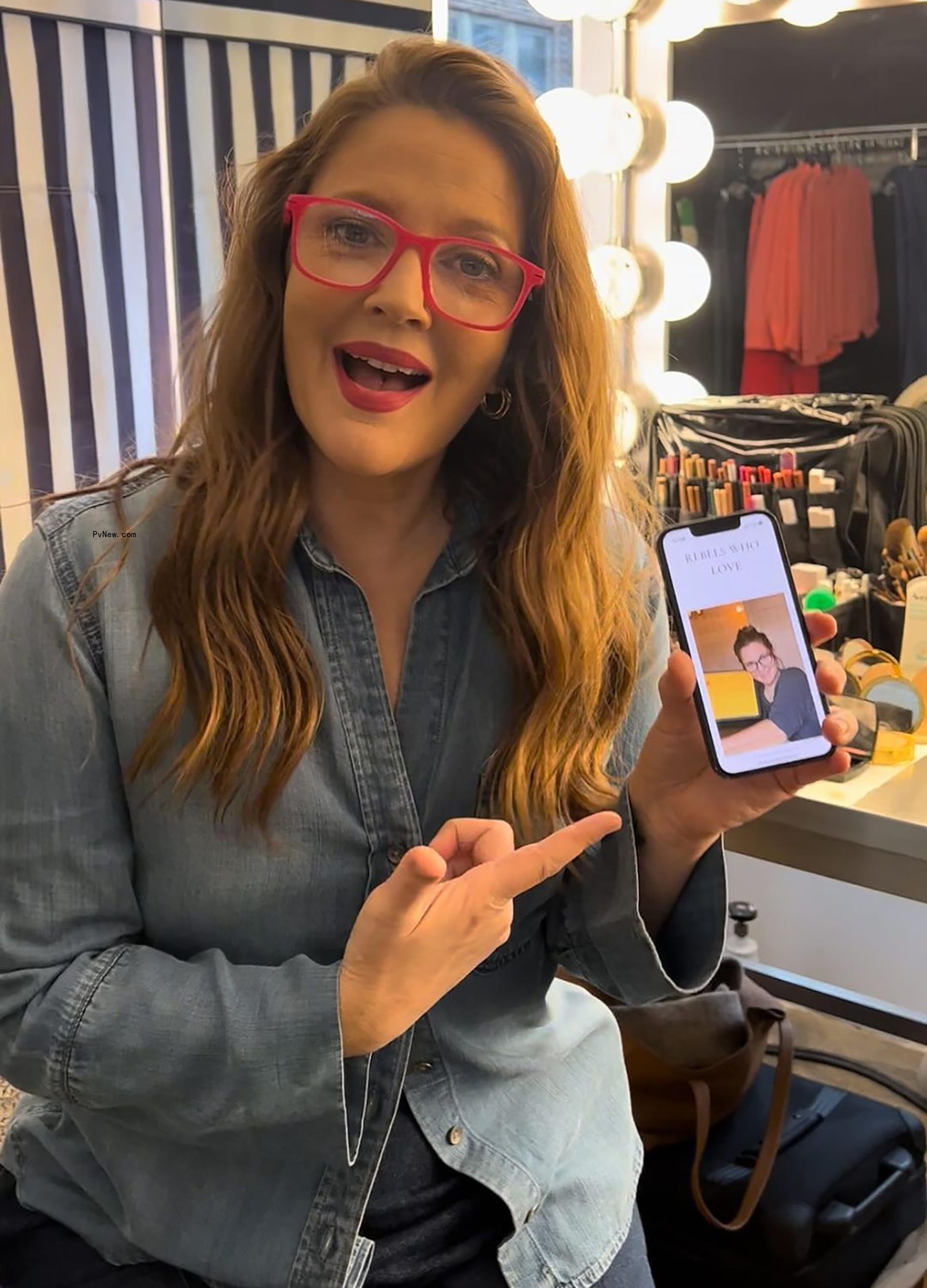 Drew Barrymore with a phone.
