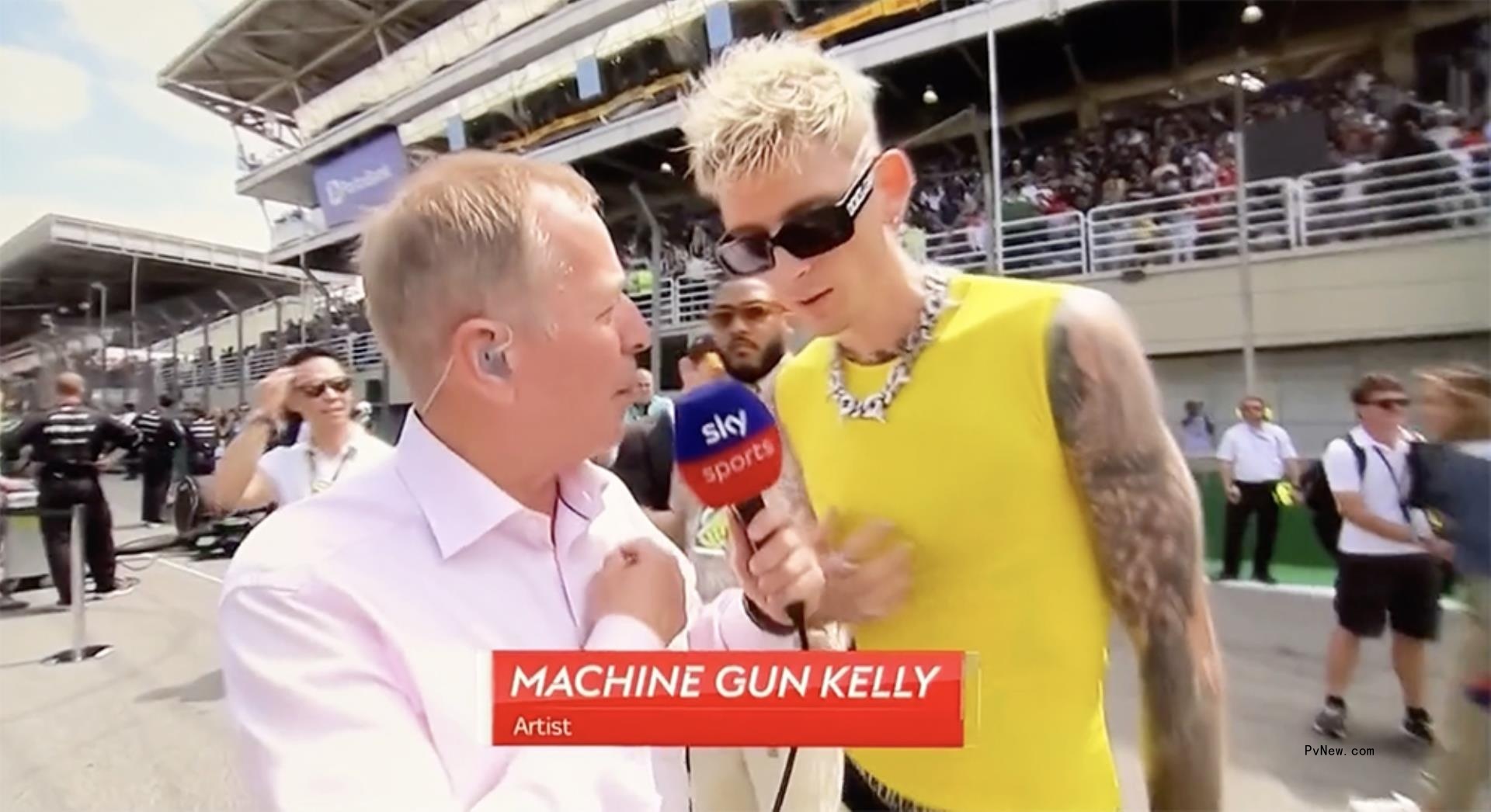 Machine Gun Kelly being interviewed by Martin Brundle