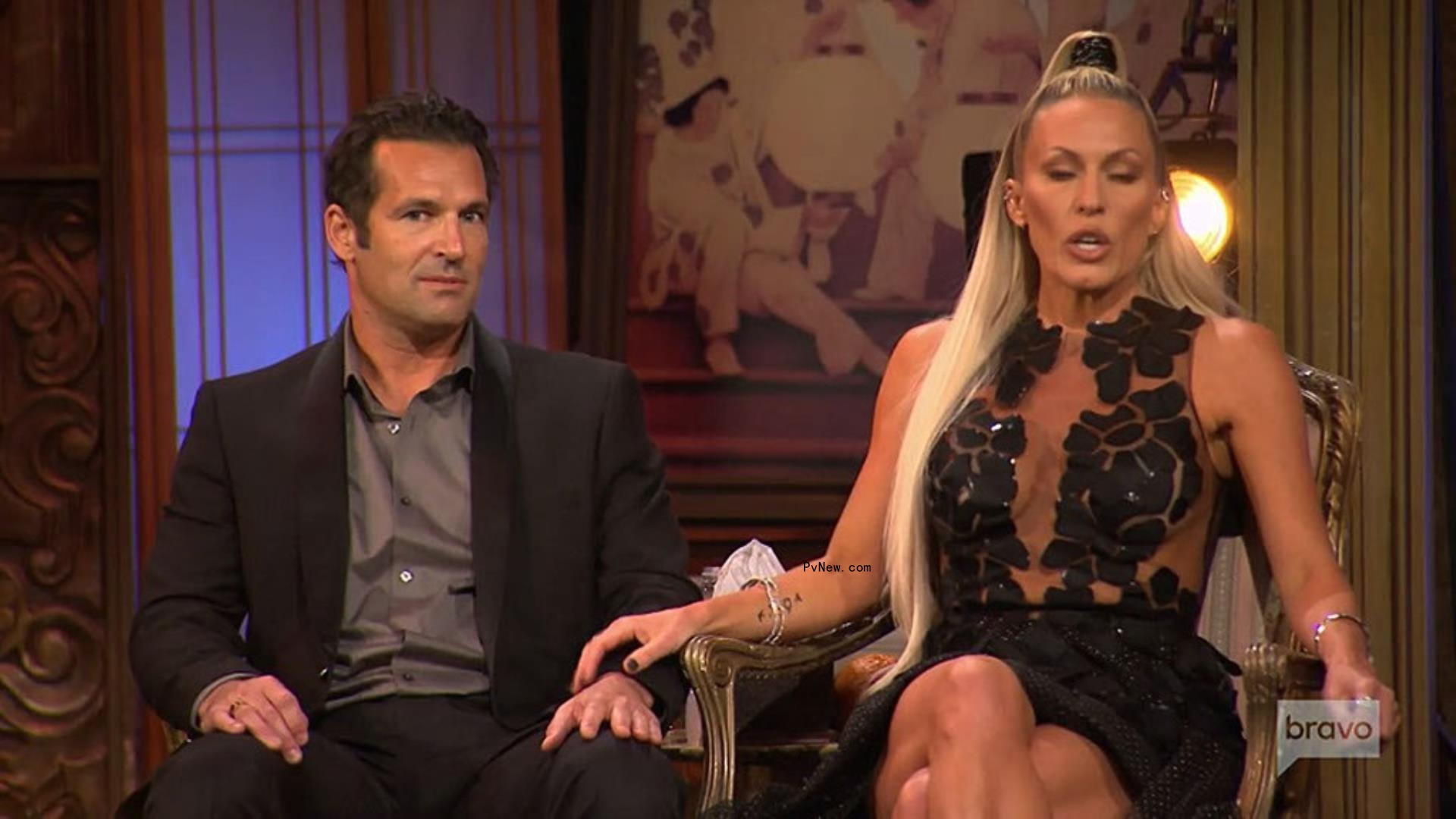 sean burke and braunwyn windham-burke sitting in chairs next to each other