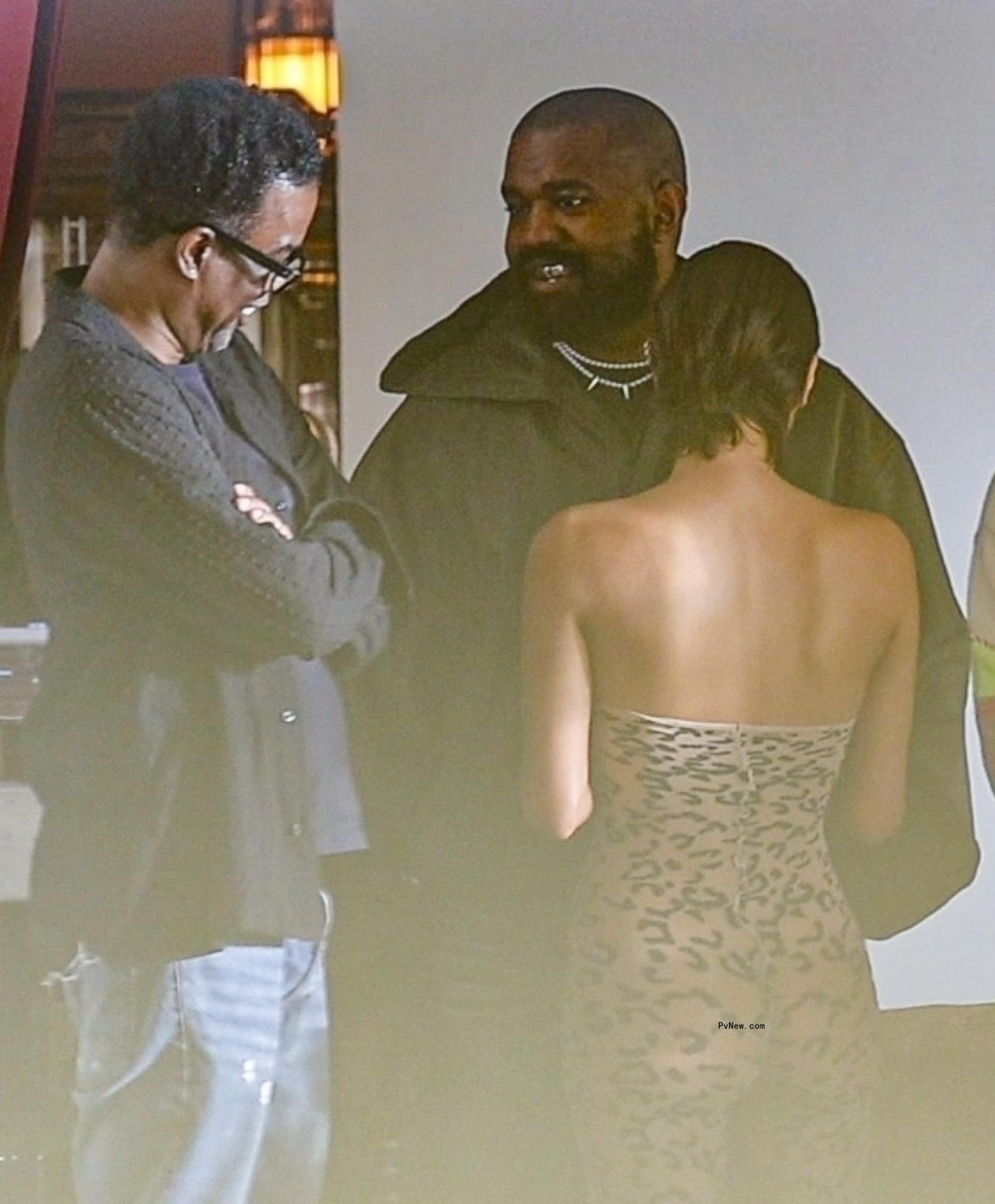 Kanye West, Bianca Censori and Chris Rock.