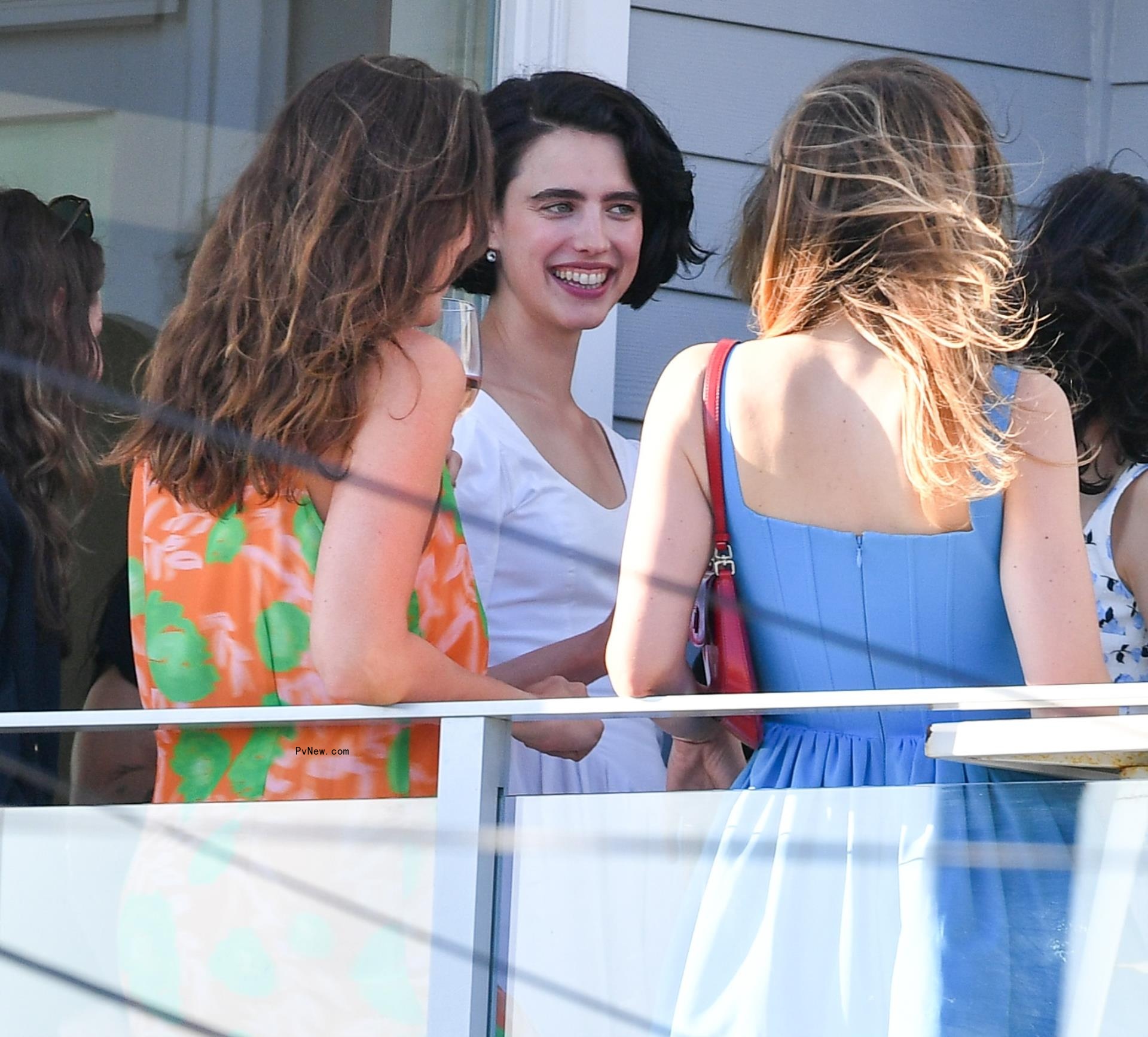 Actress Margaret Qualley is pictured surrounded by friends at her rehearsal dinner.