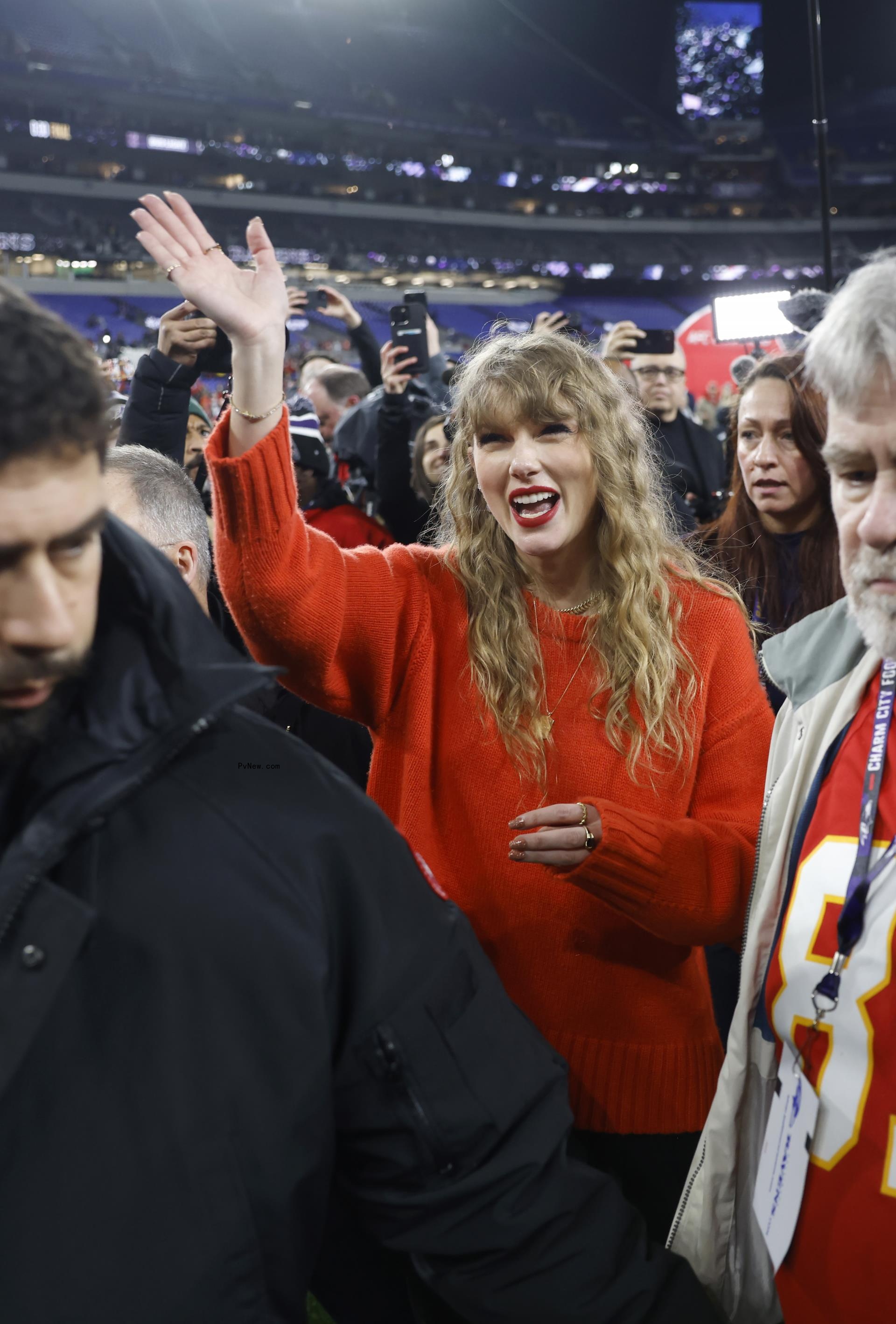 Taylor Swift pictured on the field after the Kansas City Chiefs defeated the Baltimore Ravens in the AFC Champio<i></i>nship game at M&T Bank Stadium in Baltimore, MD.