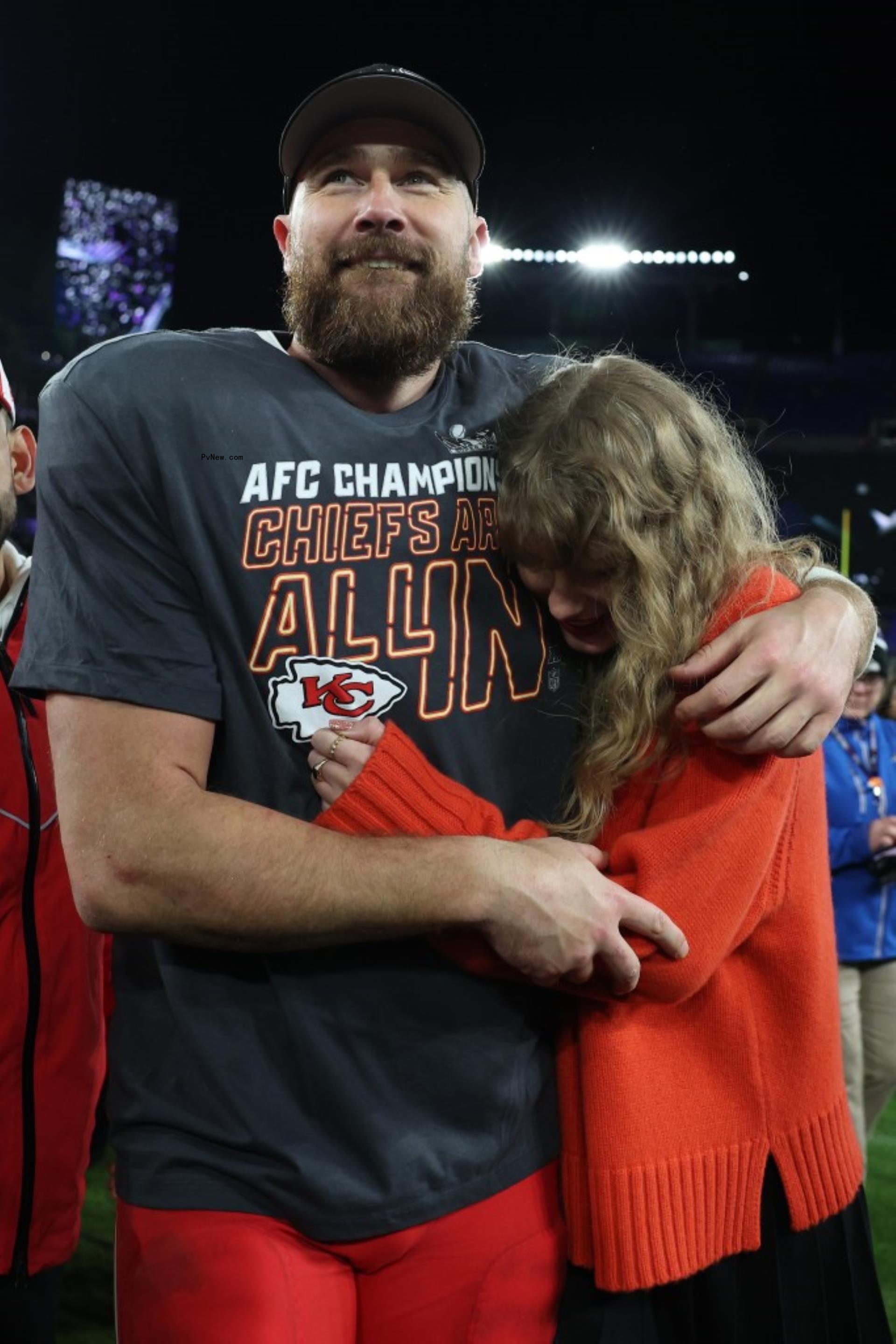 Travis Kelce and Taylor Swift hug