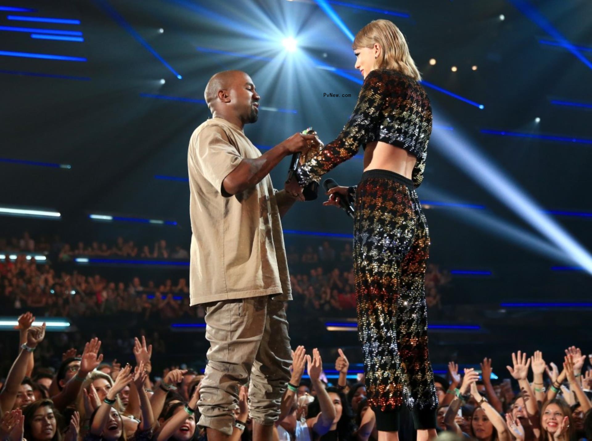 Taylor Swift and Kanye West on stage. 