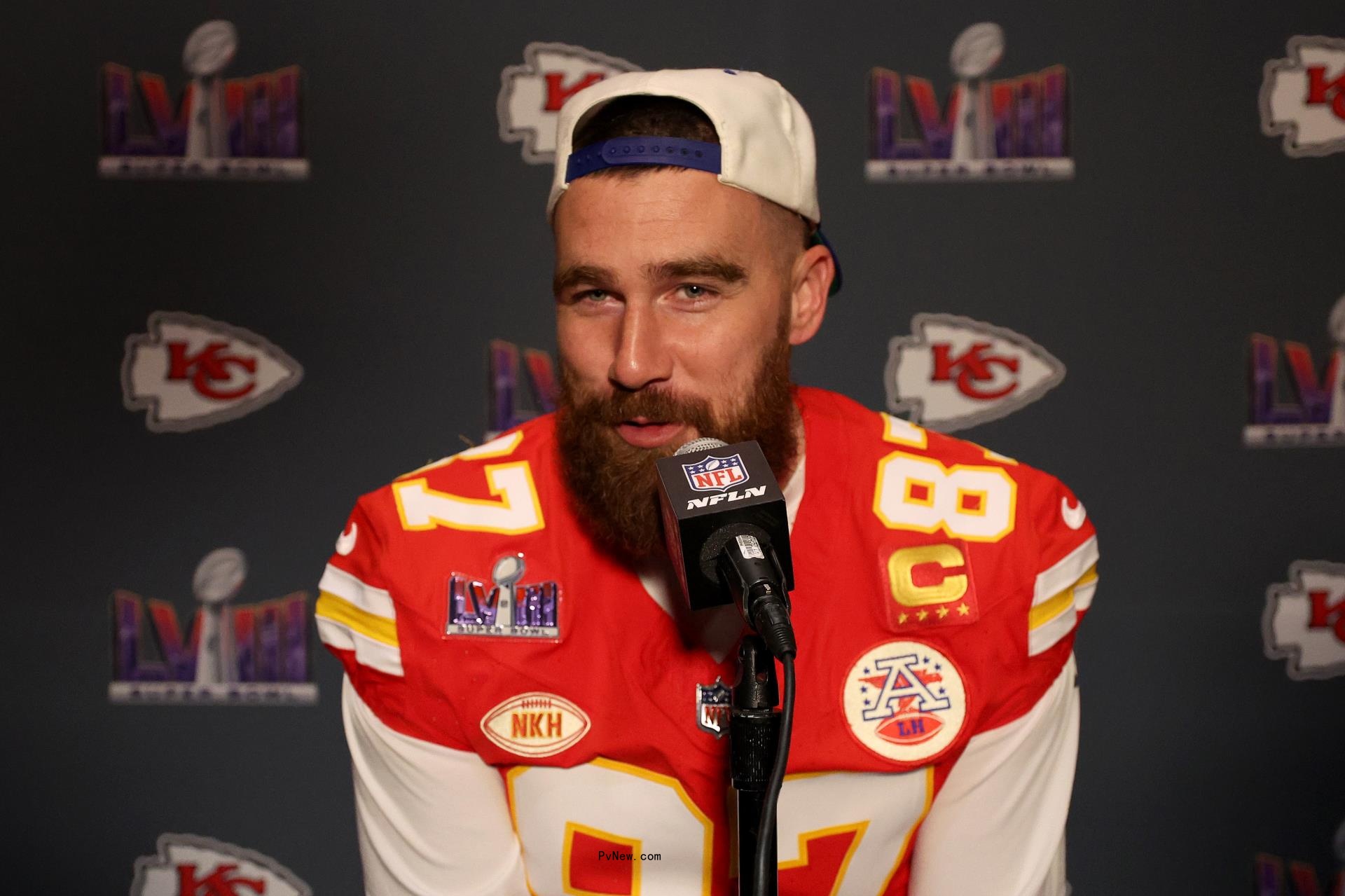 Travis Kelce speaking to the media.