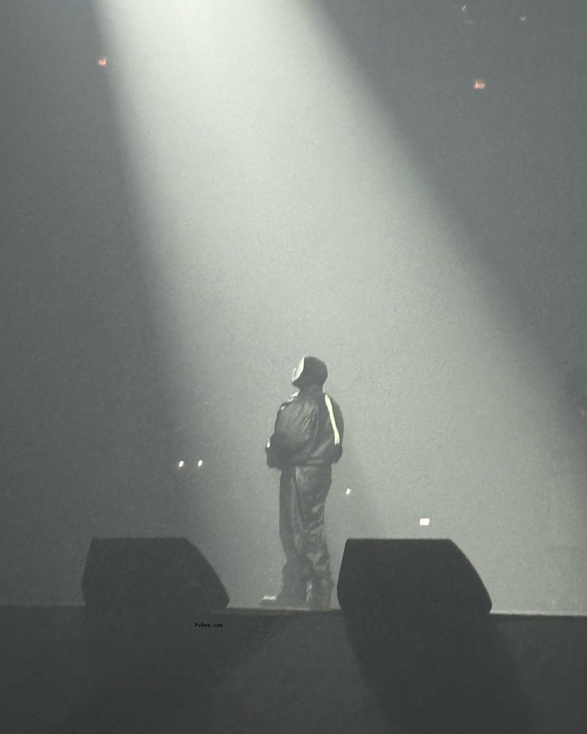 Kanye West performing