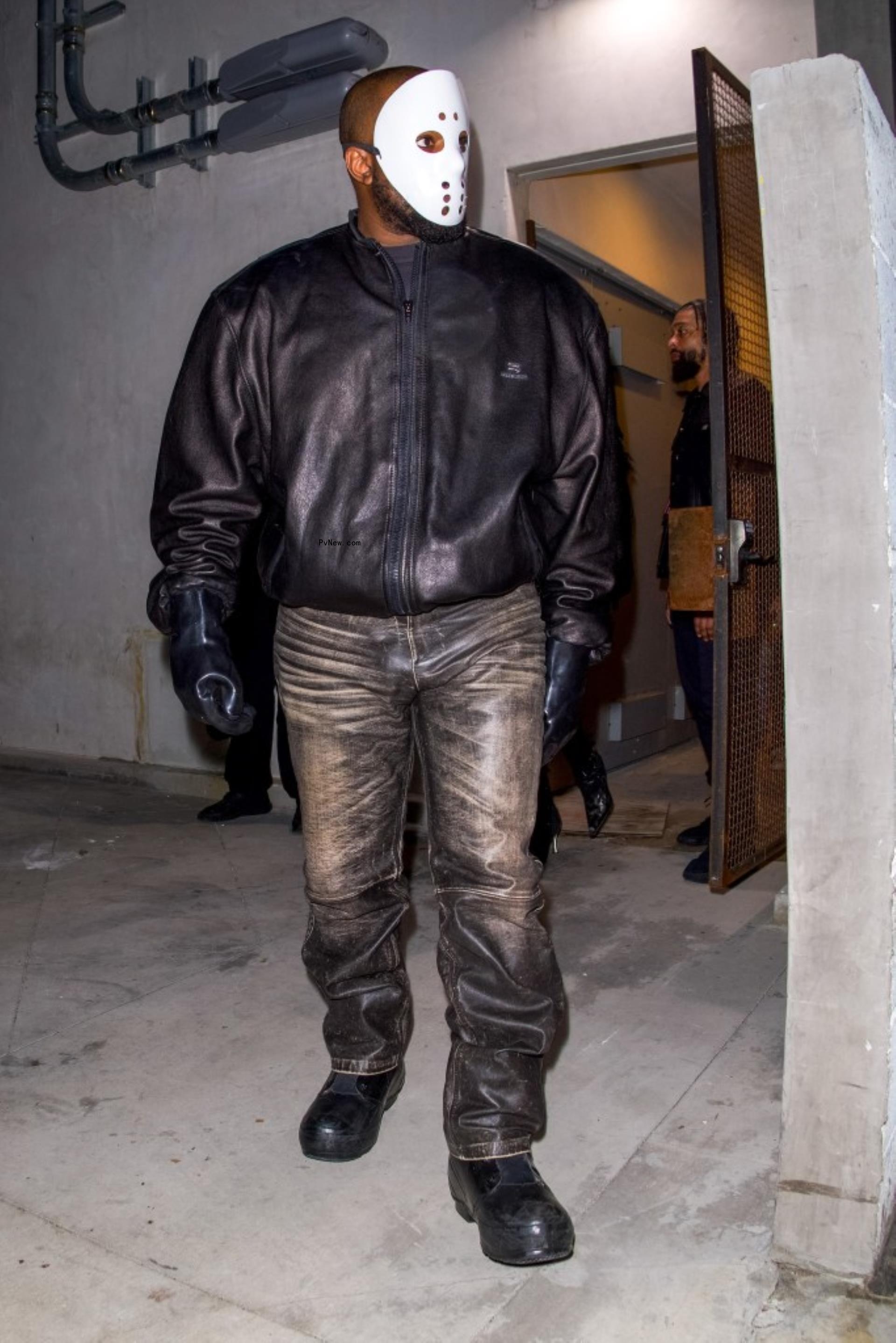 Kanye West in a white mask