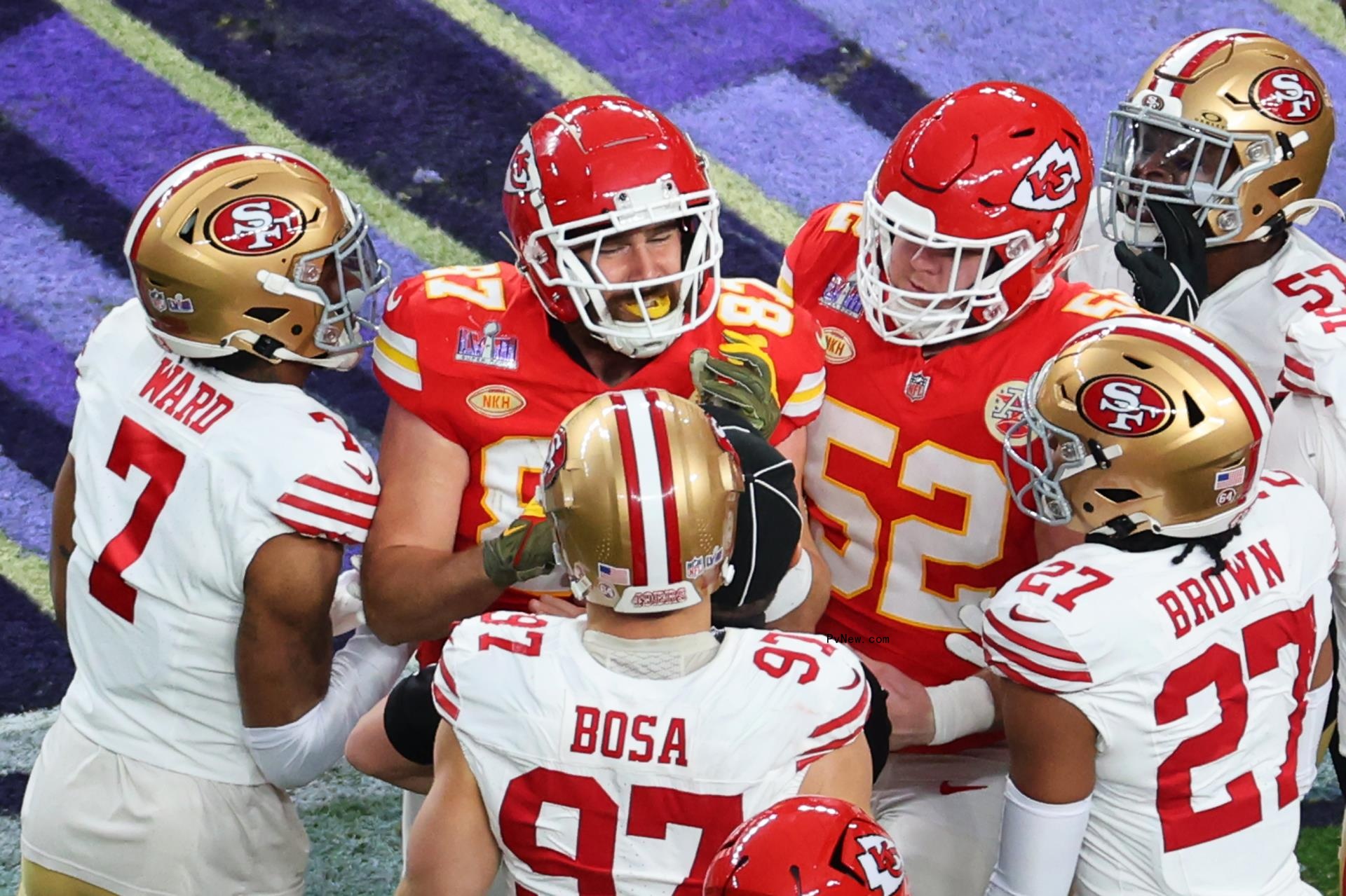 Travis Kelce arguing on the field