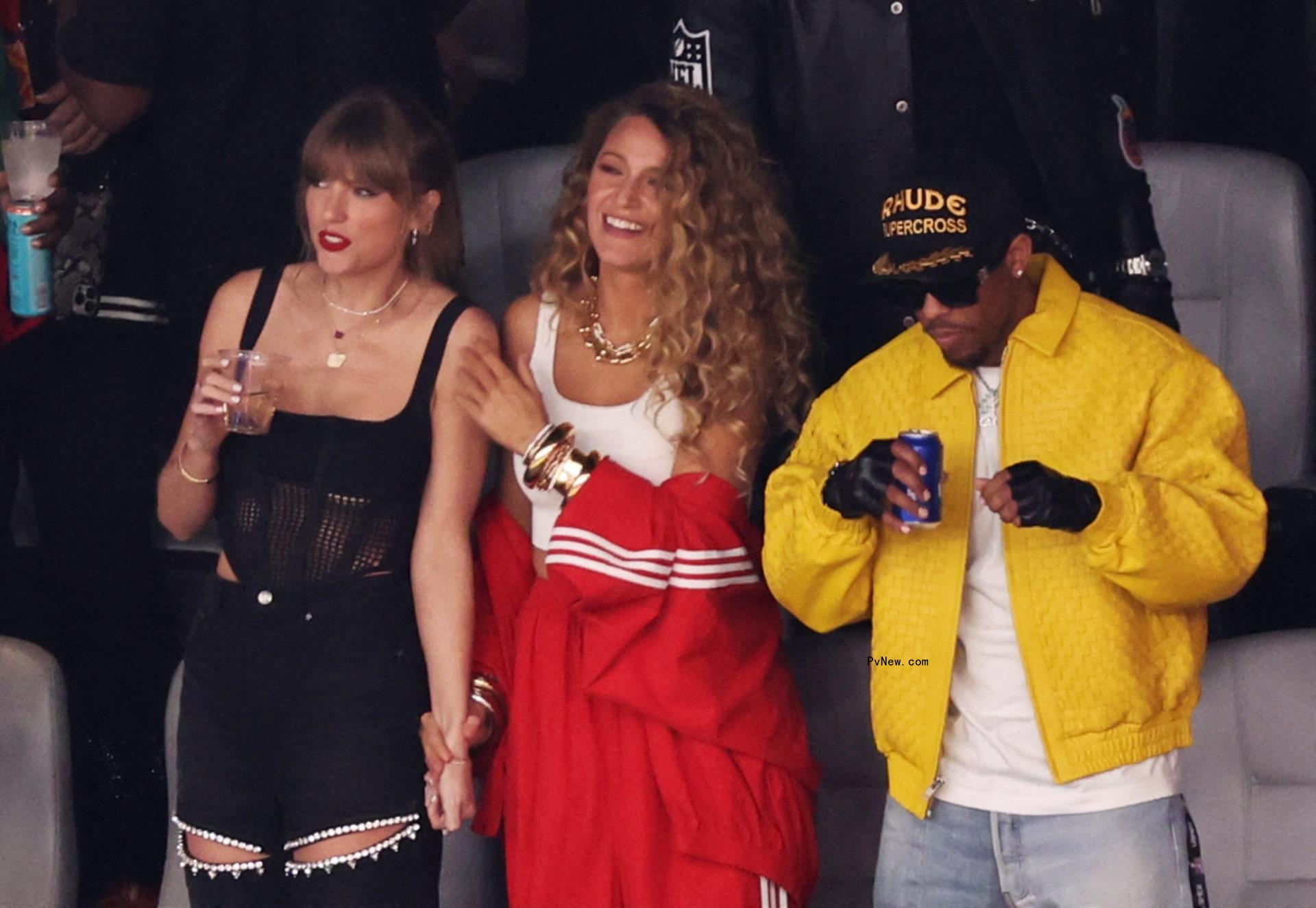 Recording artist Taylor Swift and actor Blake Lively are pictured in the stands before the game