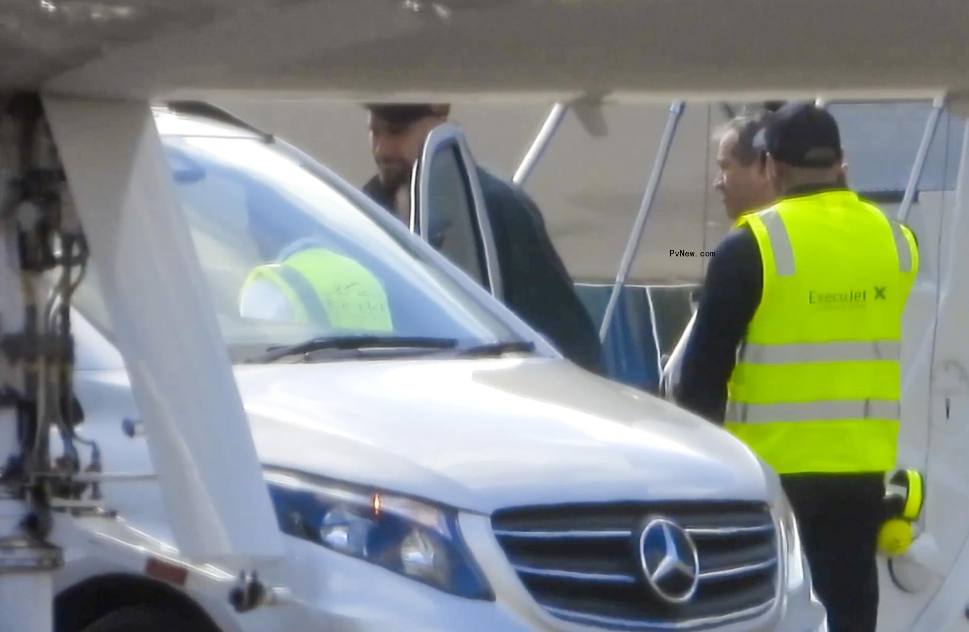 A close-up of Travis Kelce getting into a car.