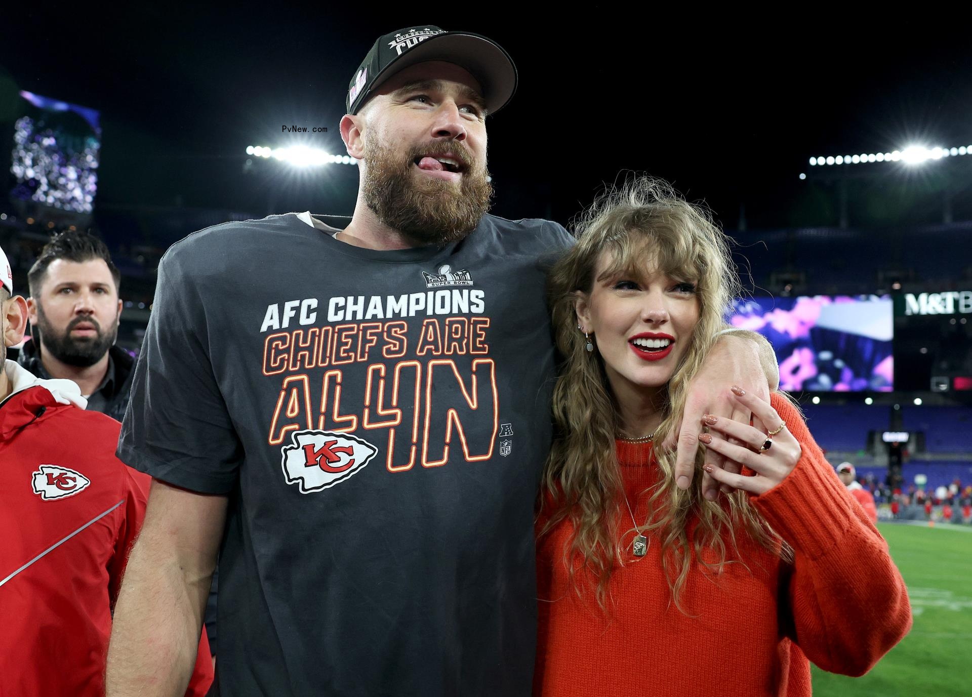 Taylor Swift and Travis Kelce celebrating after his AFC Champio<i></i>nship Game win.