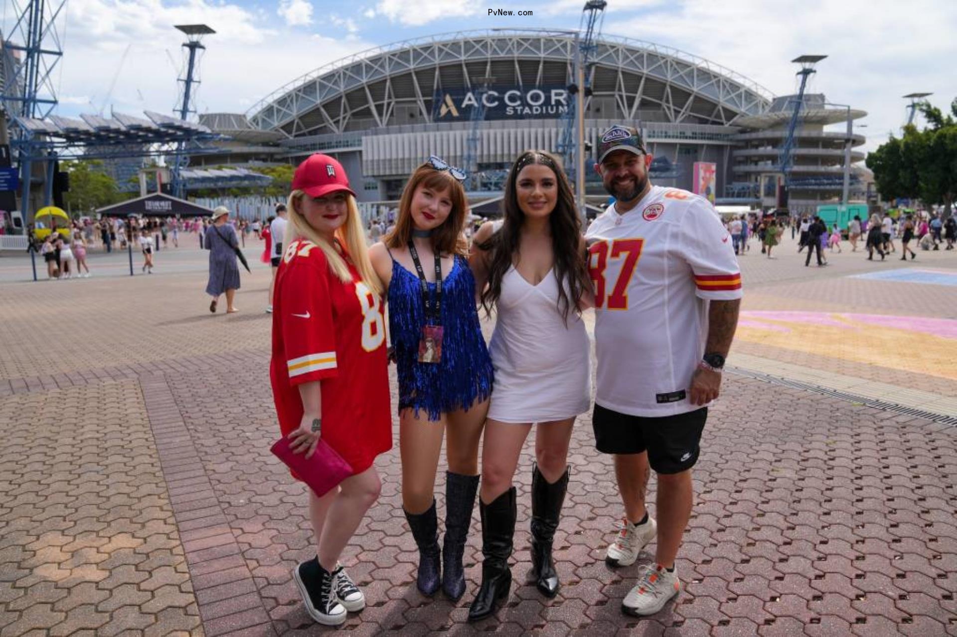 Swifties wearing Travis Kelce jerseys. 