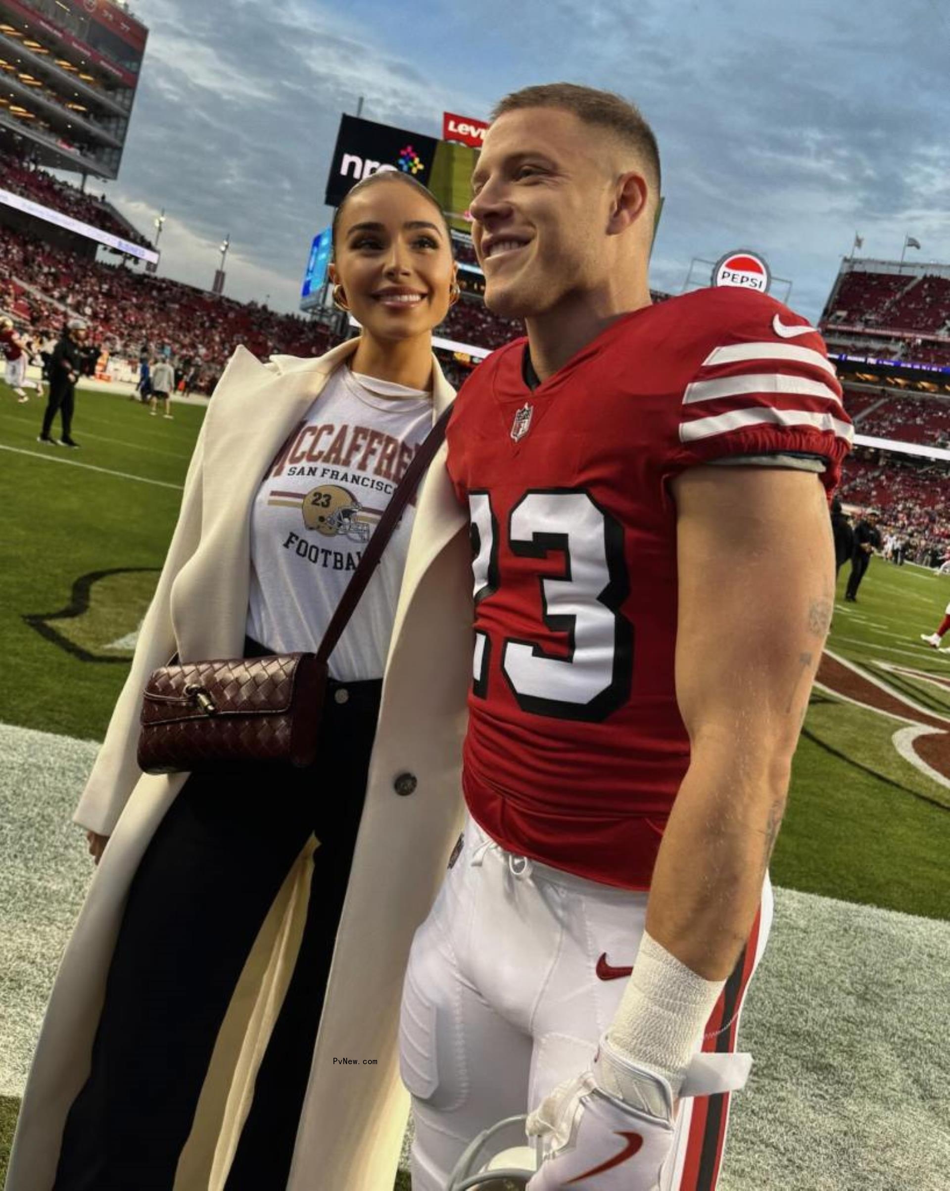 Olivia Culpo and Christian McCaffrey at the 2024 Super Bowl.