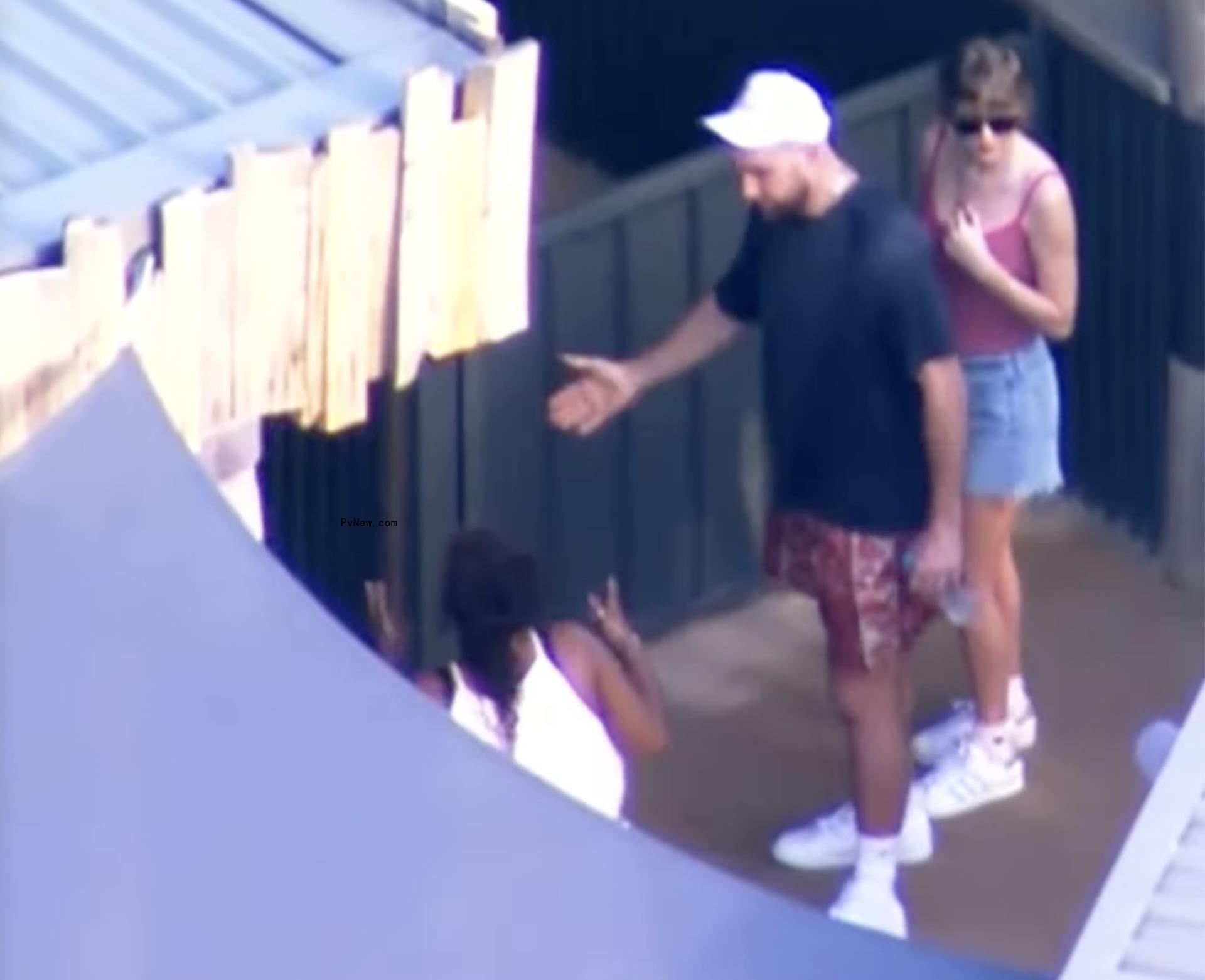 Travis Kelce and Taylor Swift holding hands at the Sydney Zoo