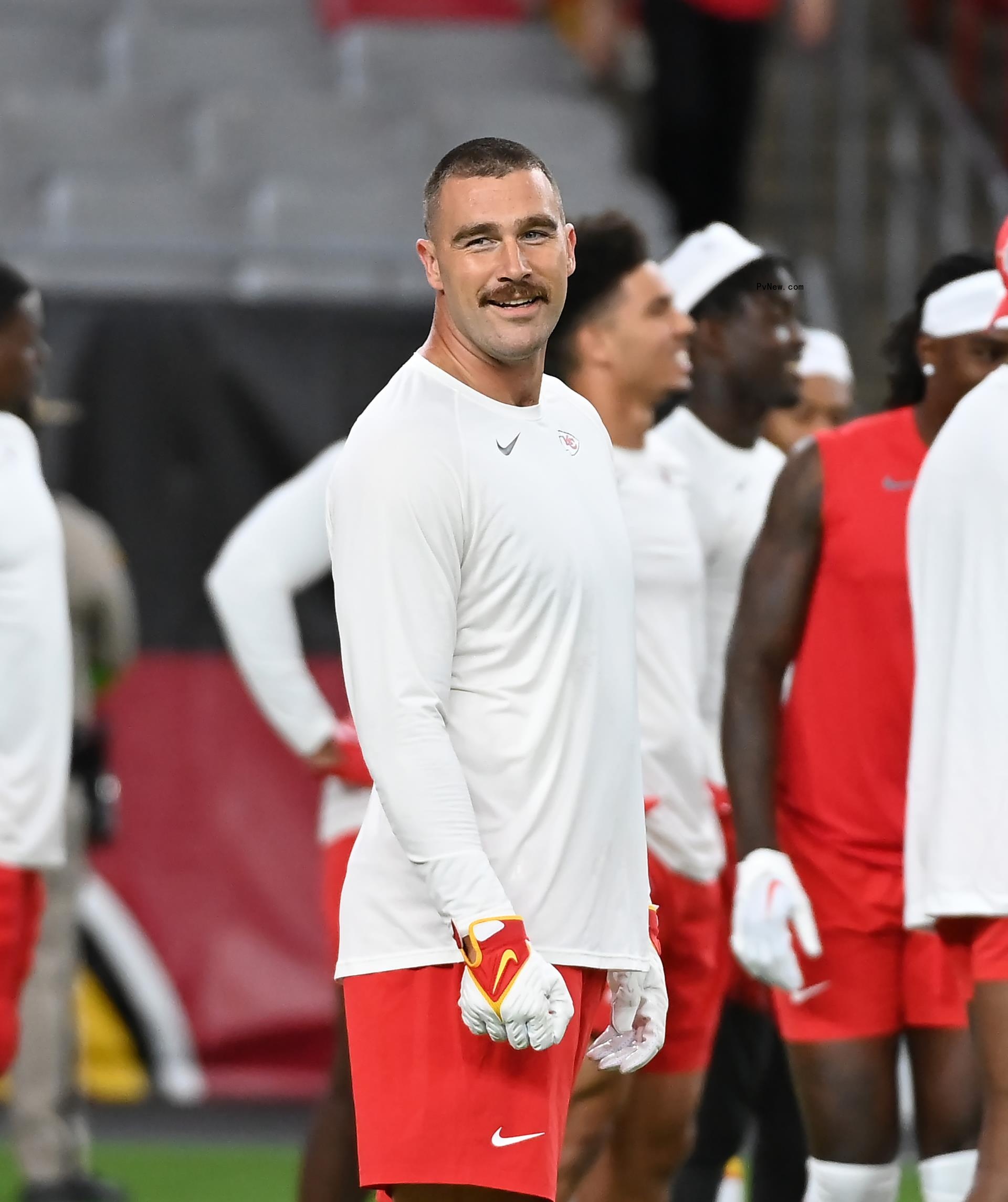 Travis Kelce standing