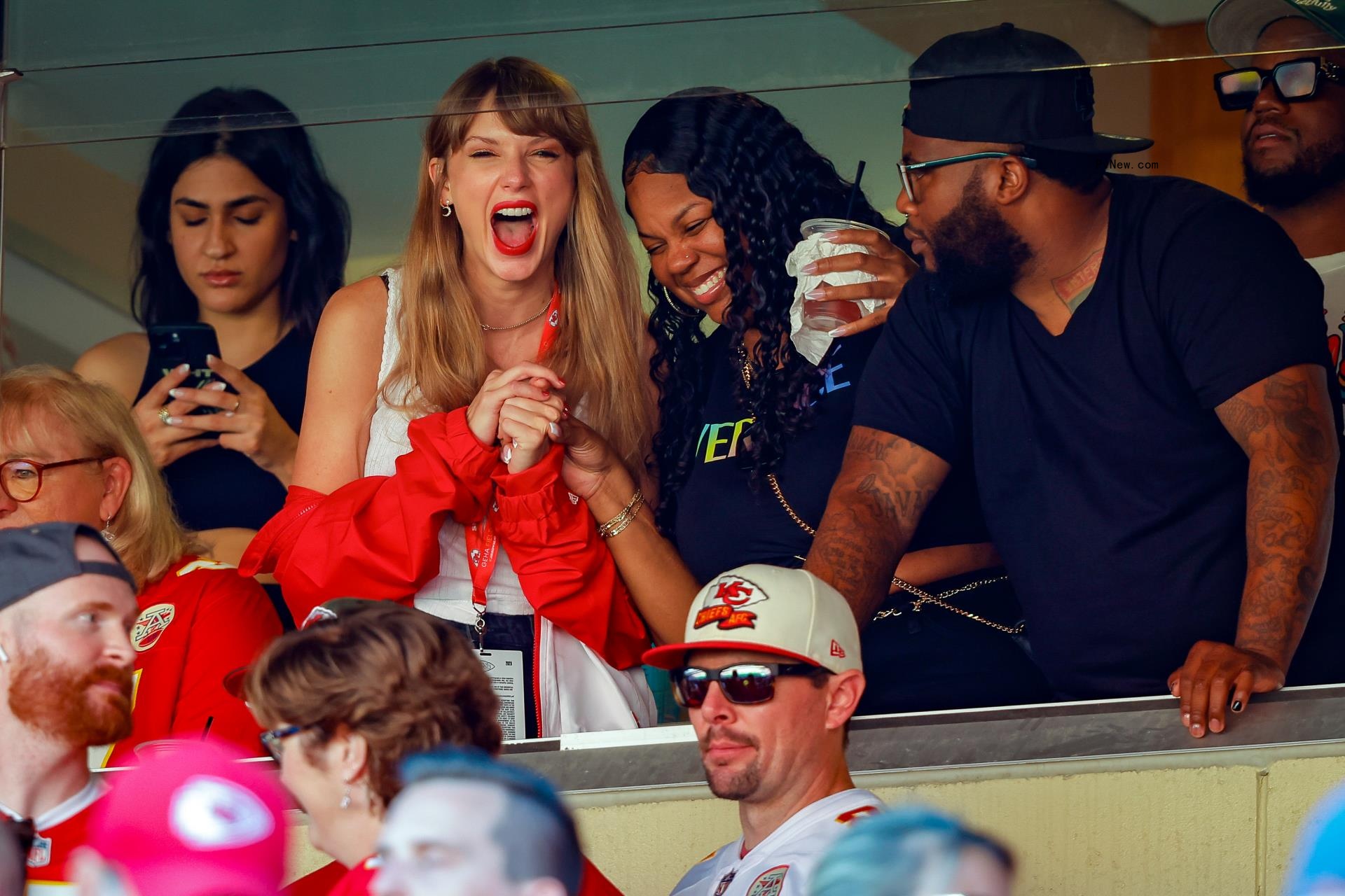 Taylor Swift cheering at a Kansas City game