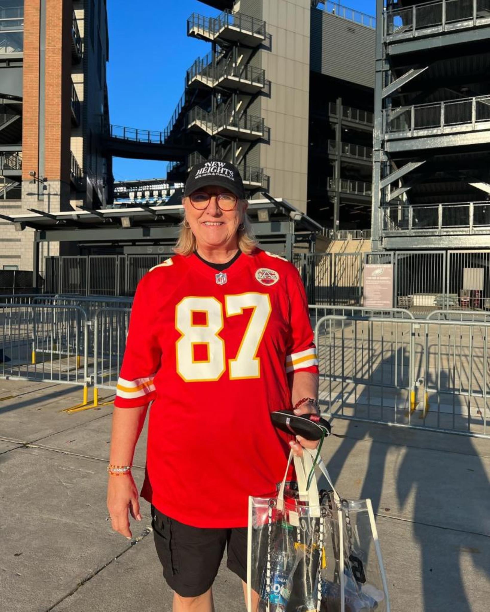 Do<i></i>nna Kelce smiles in a Chiefs jersey