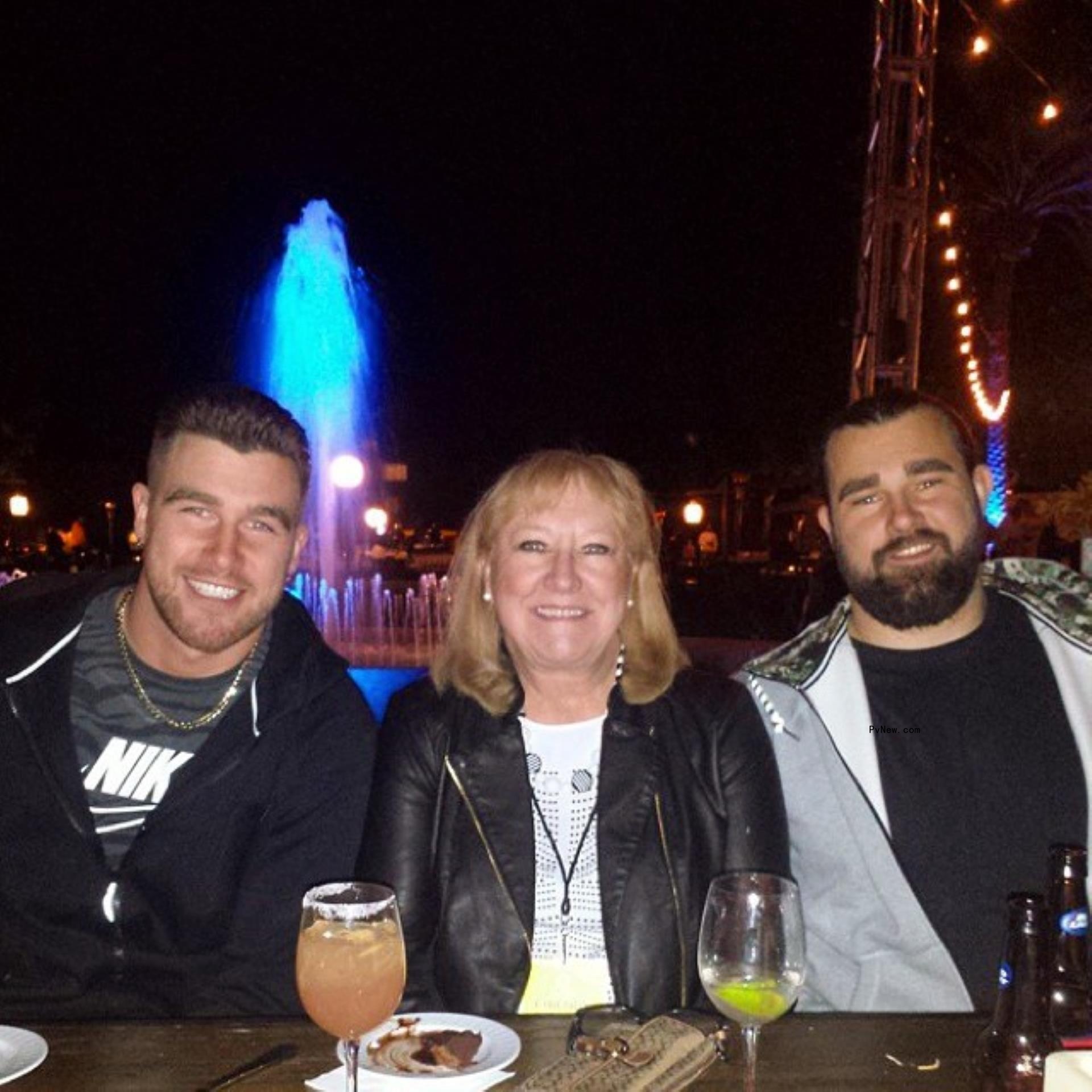 Travis Kelce, Do<i></i>nna Kelce and Jason Kelce