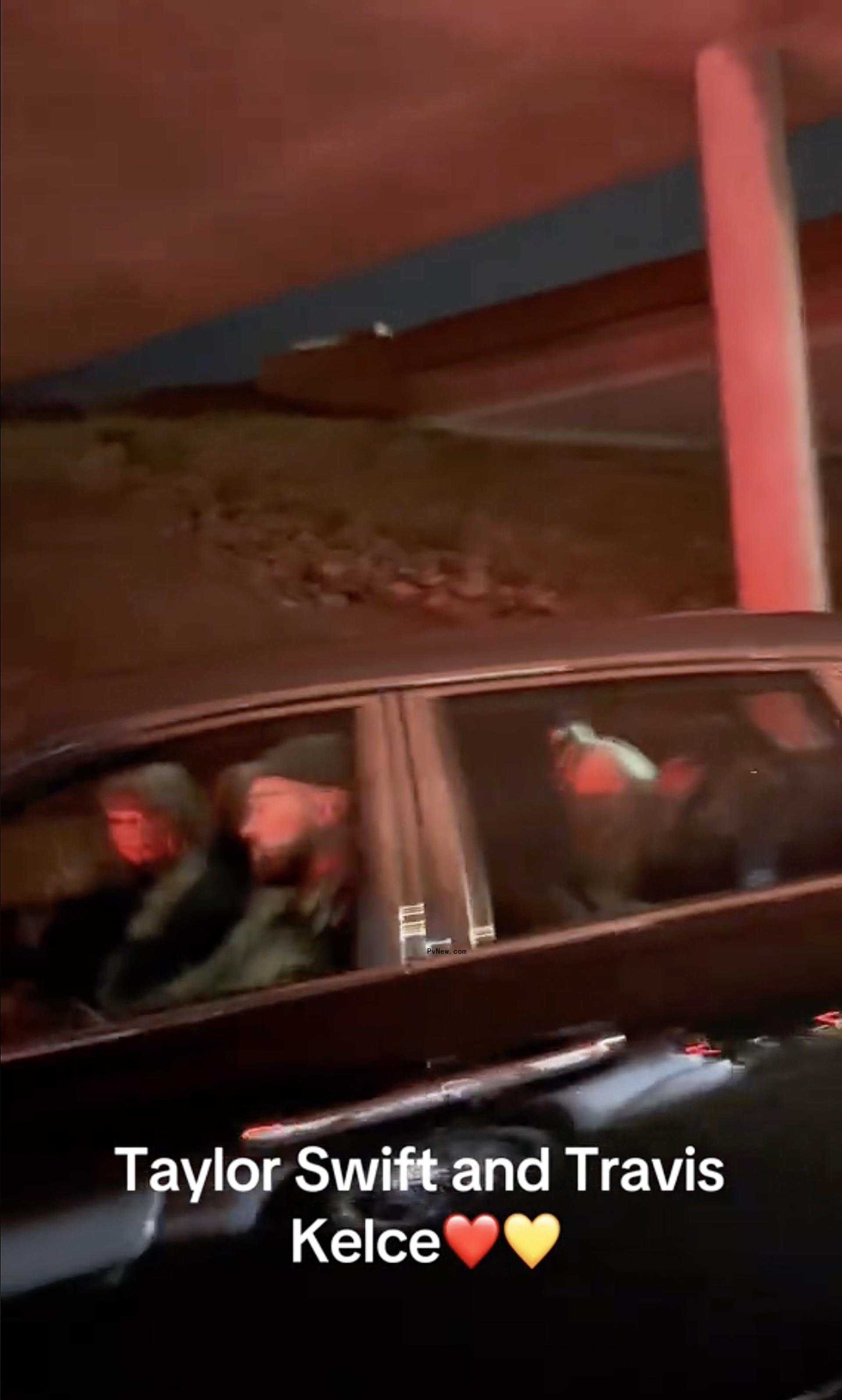 Taylor Swift and Travis Kelce in a car.