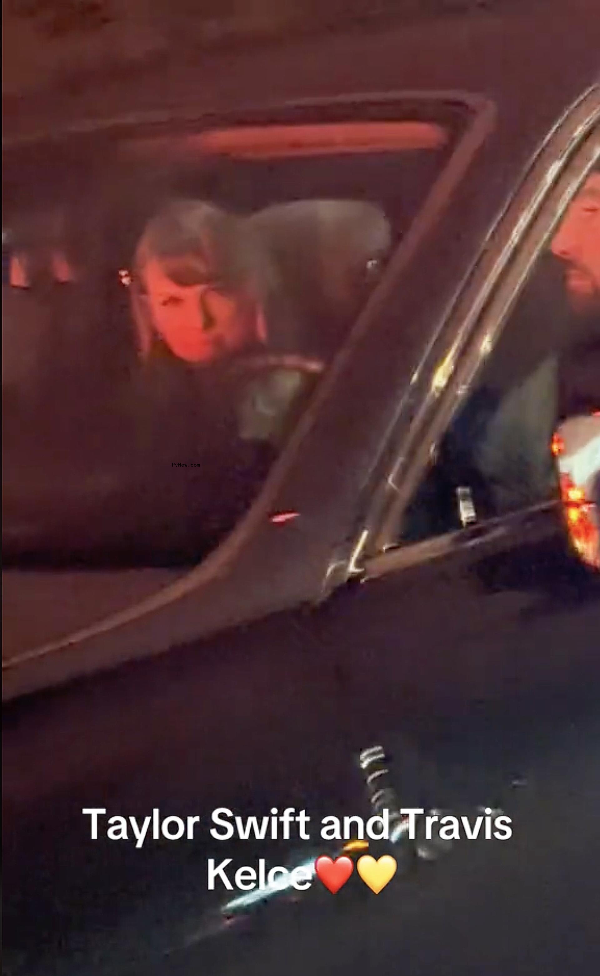 Taylor Swift and Travis Kelce in a car.