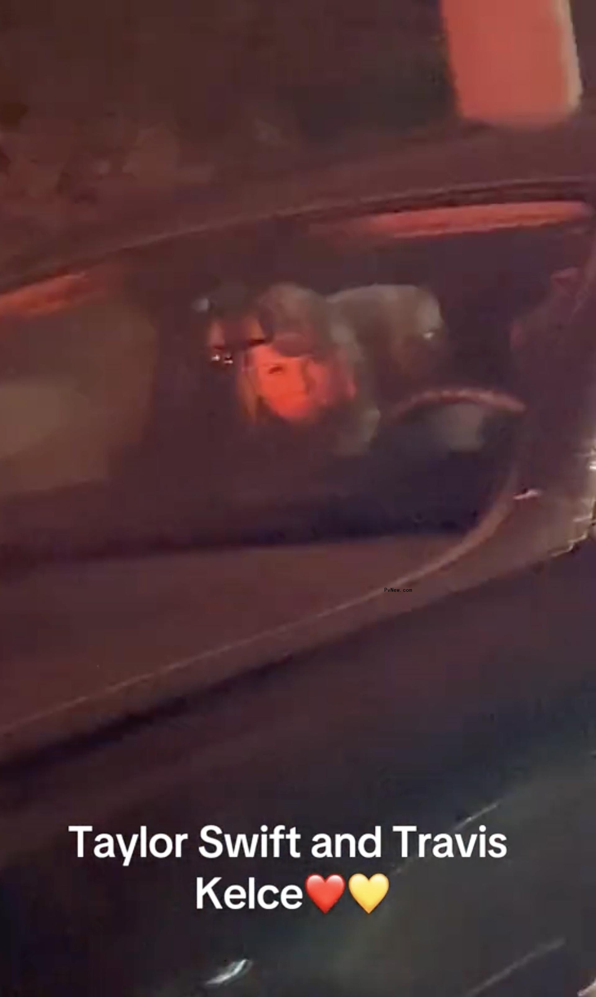 Taylor Swift and Travis Kelce in a car.