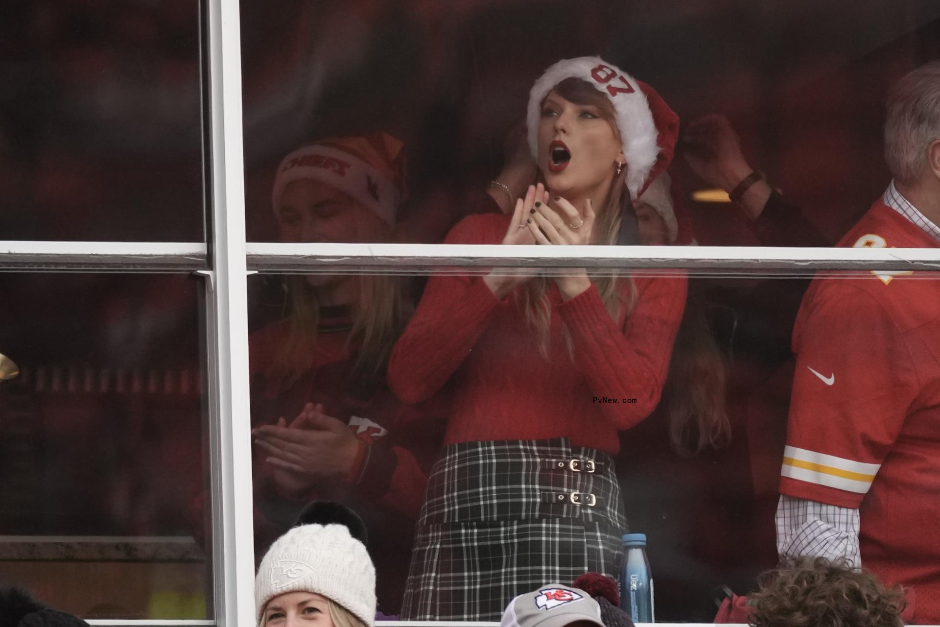 Taylor Swift watching her boyfriend's football game.