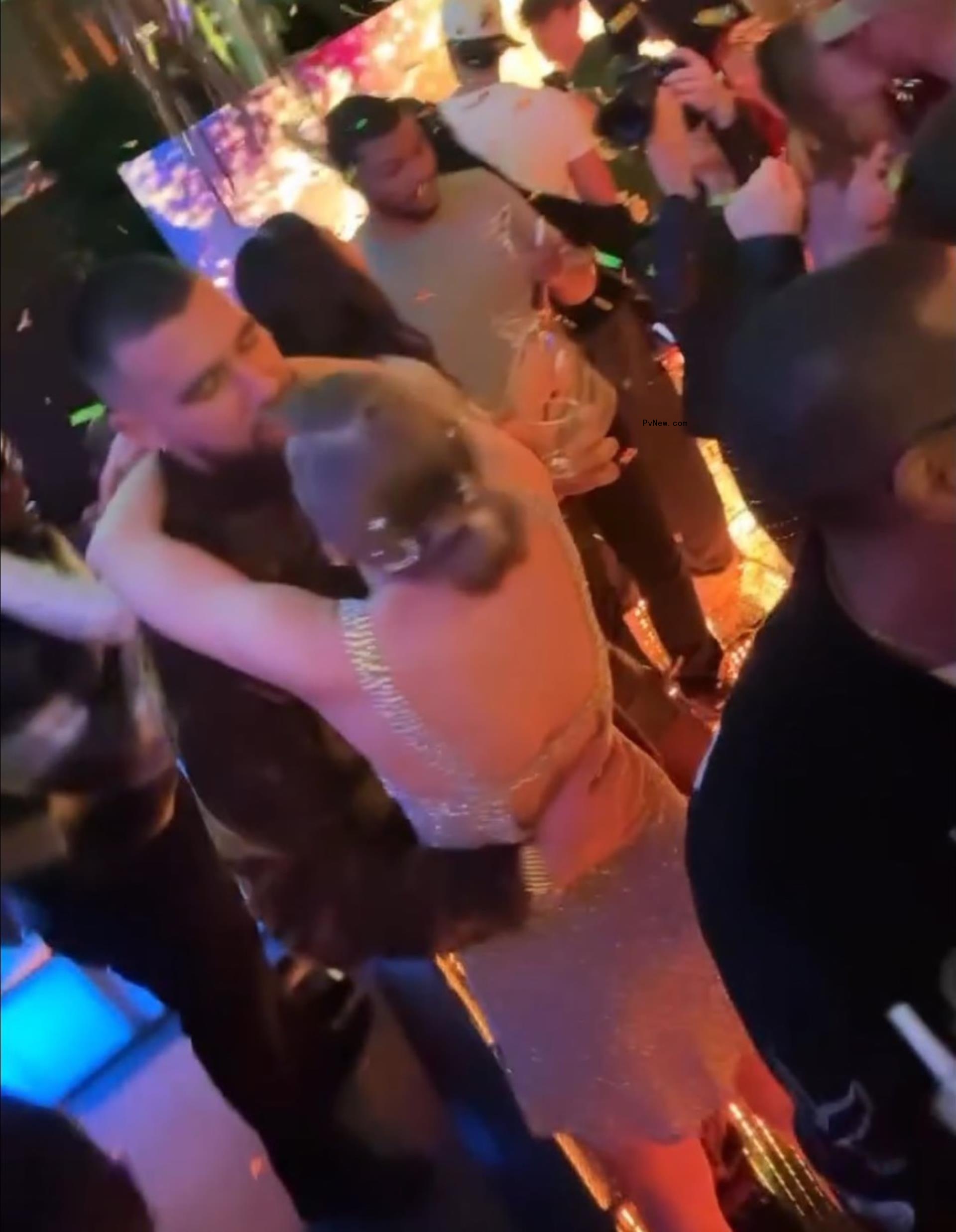 Taylor Swift and Travis Kelce pose with friends and Patrick and Britany Mahomes