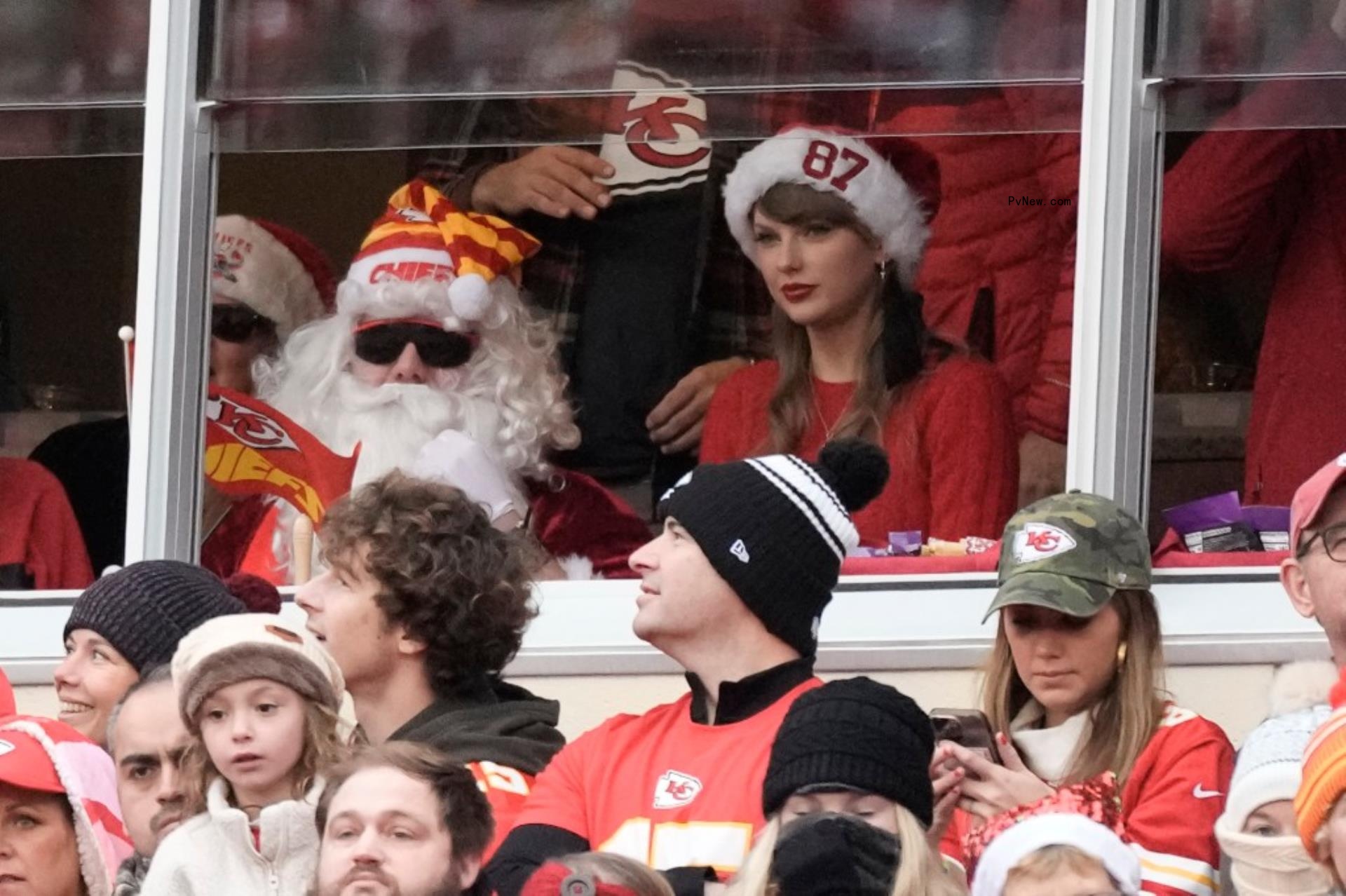 Taylor Swift and Austin Swift at a Chiefs game