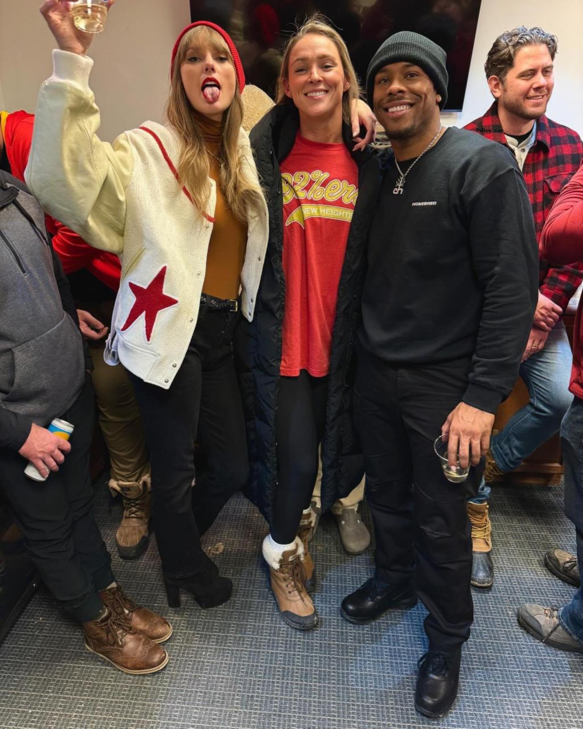 Taylor Swift, Kylie Kelce and Aric Jo<i></i>nes posing together
