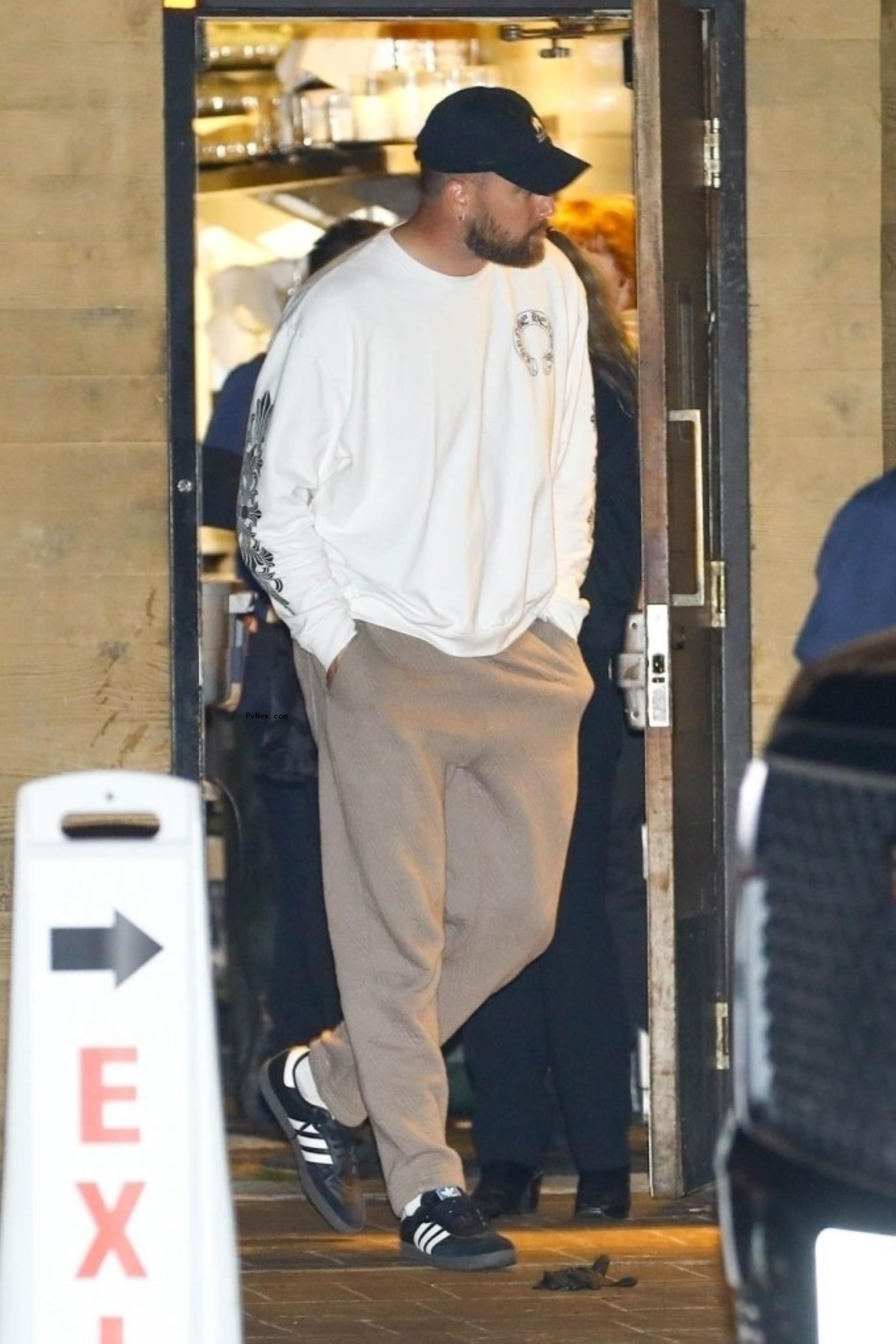 Travis Kelce leaving Nobu Malibu.