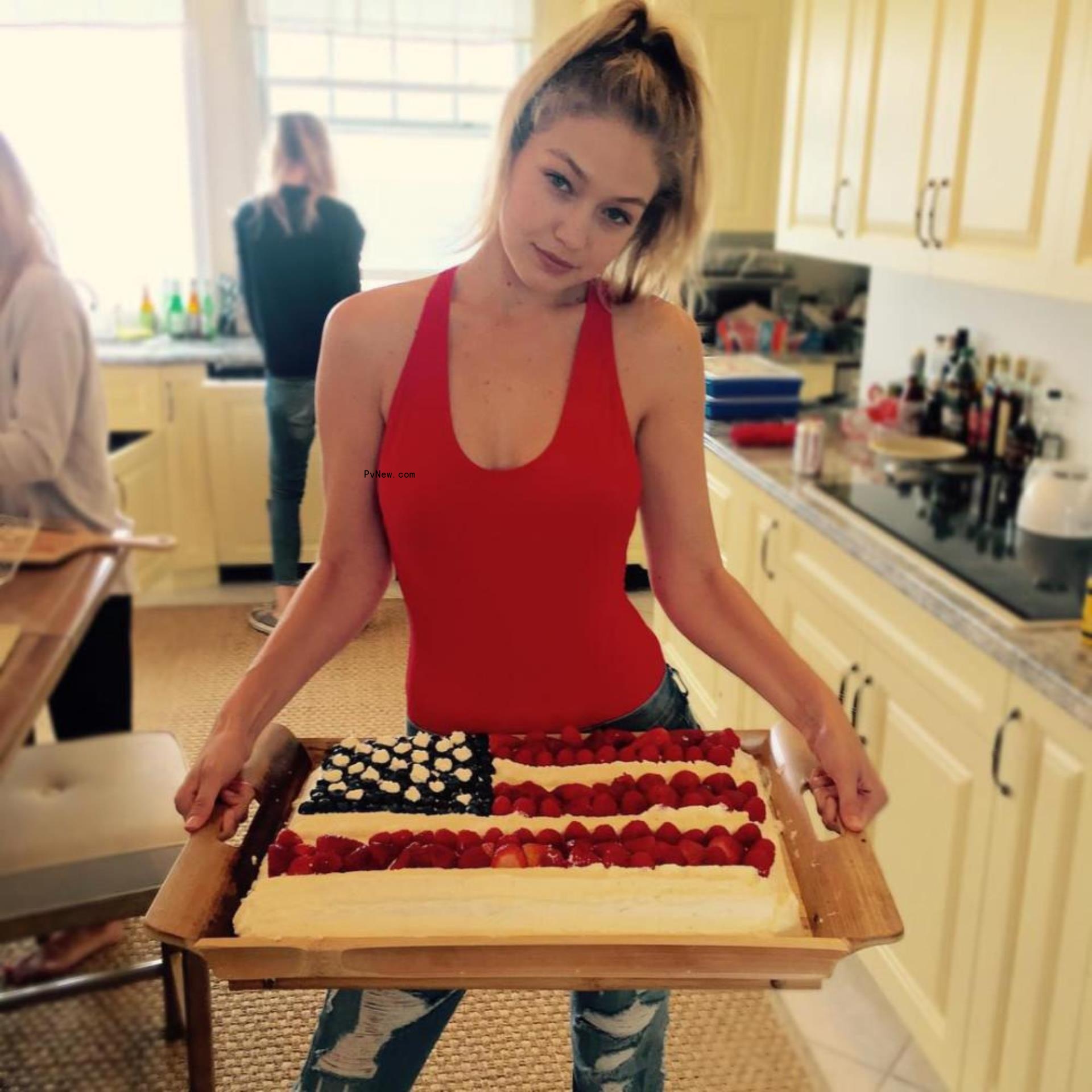 Gigi hadid inside taylor swift's rhode island home's kitchen.