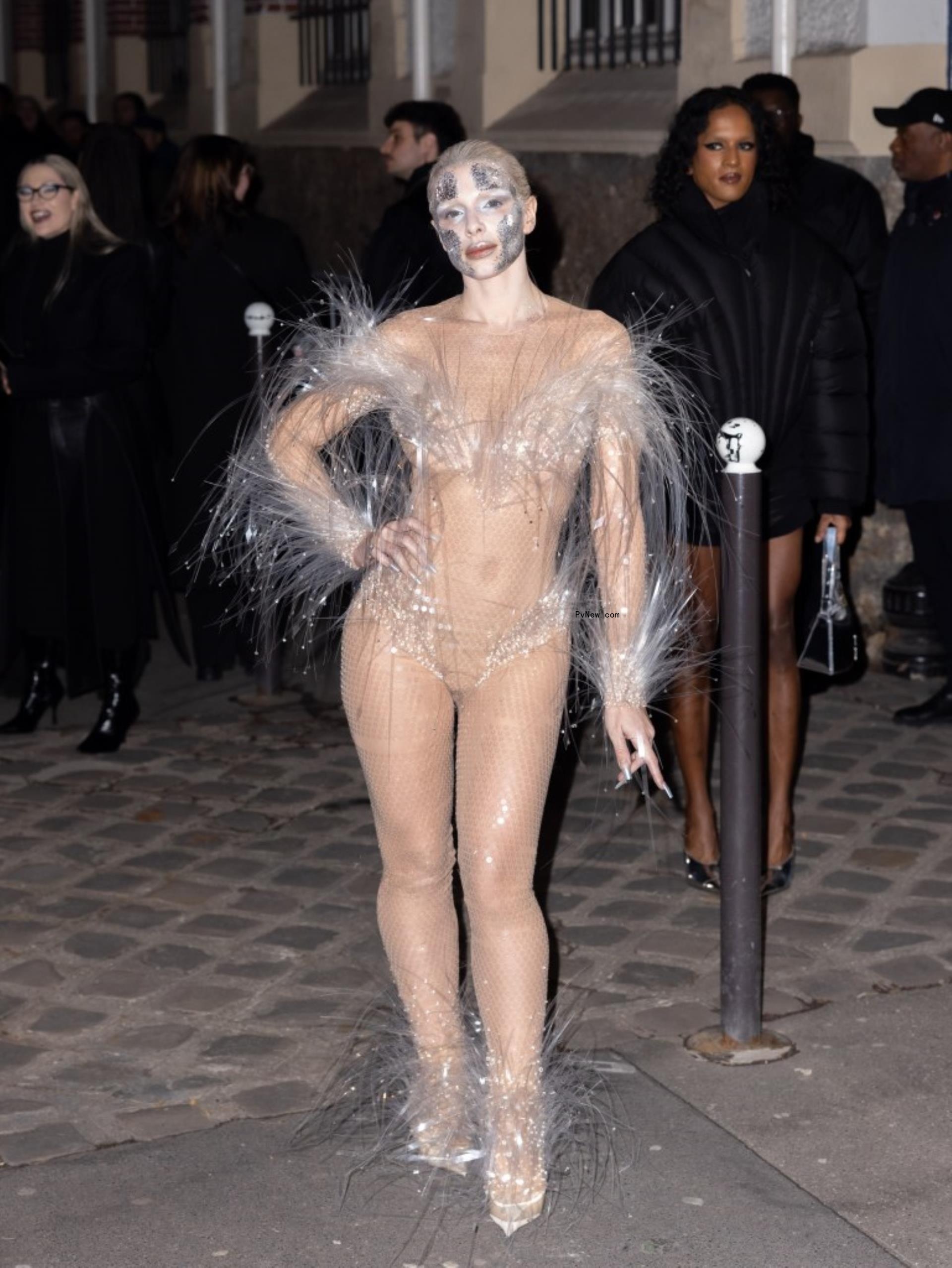 Julia Fox wearing a sheer catsuit at the Mugler Fall 2024 show