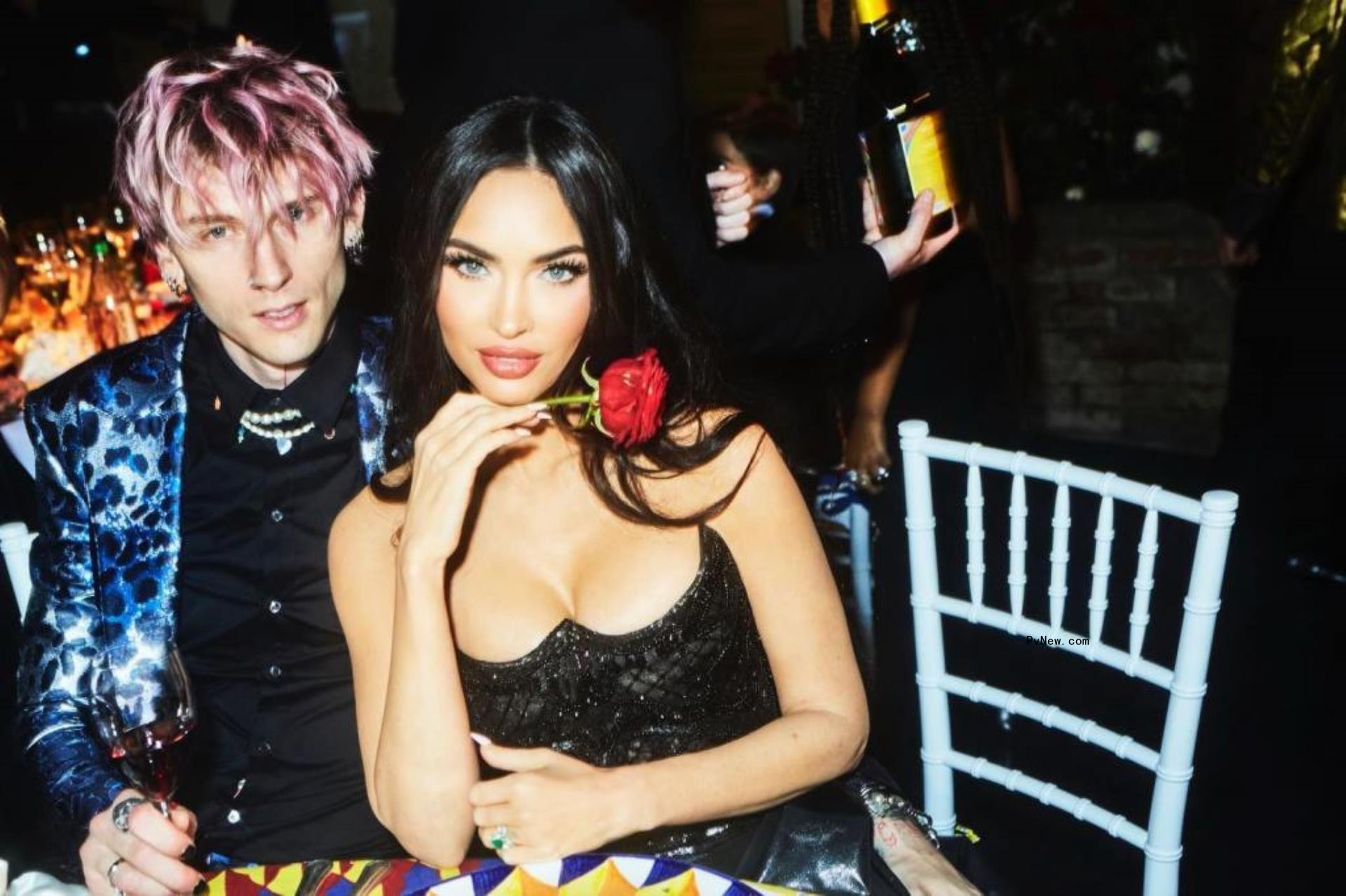 Megan Fox and Machine Gun Kelly sitting