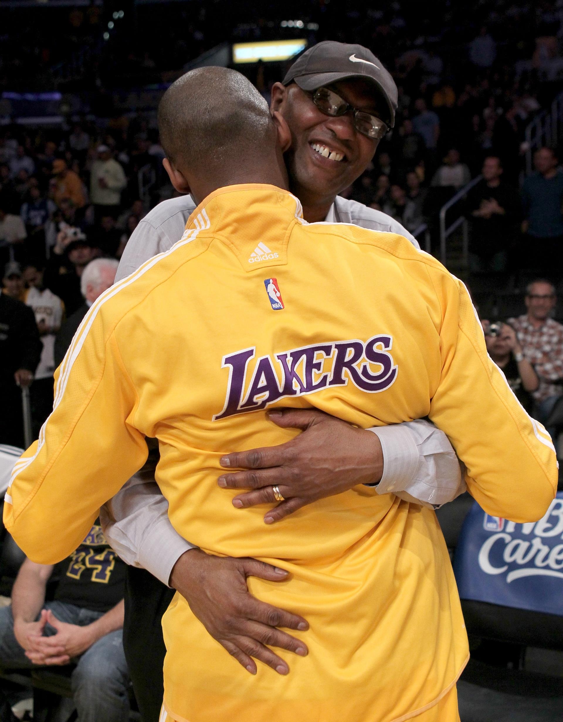 Kobe Bryant hugging his dad, Joe Bryant, in 2010.