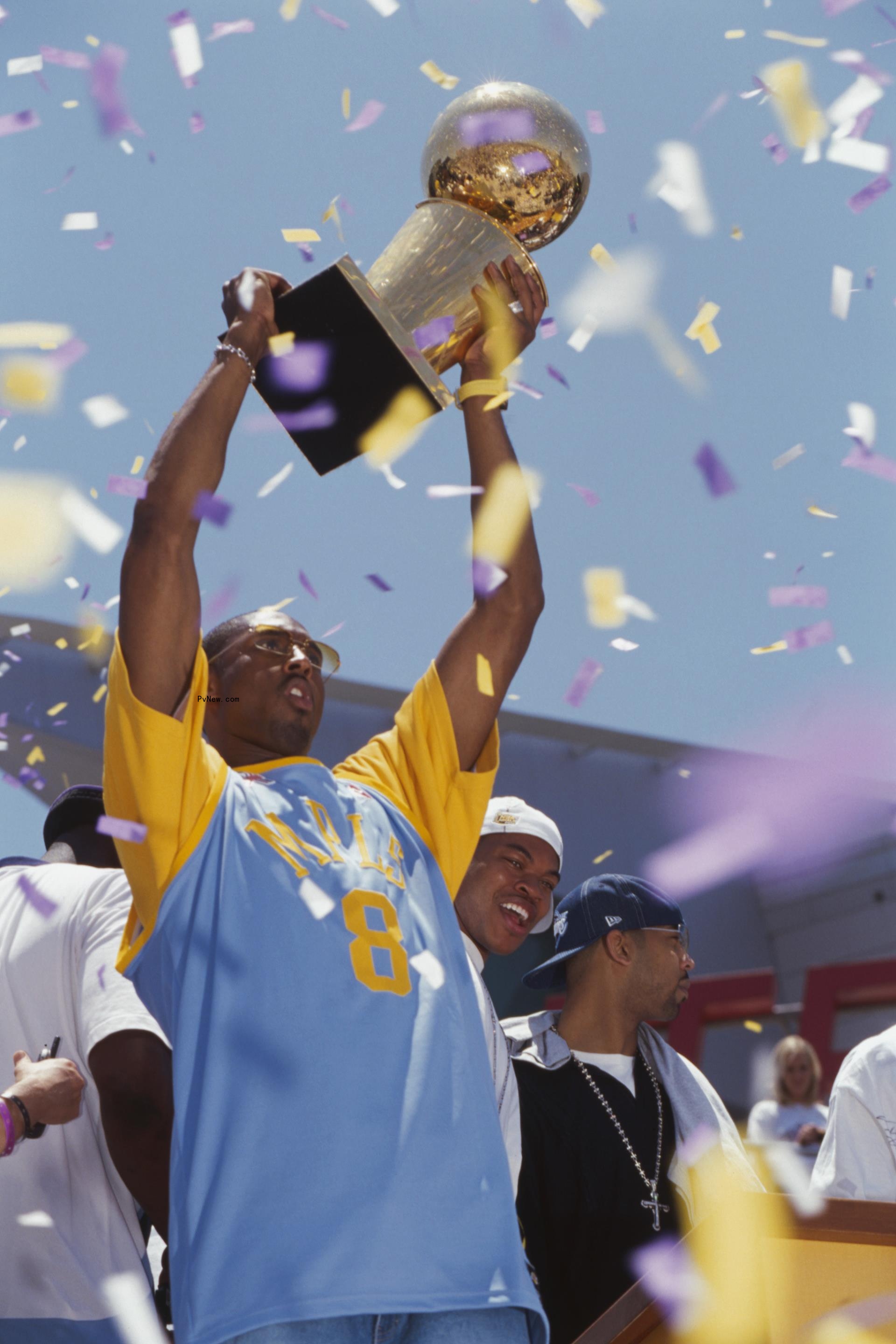 Kobe Bryant celebrating the Lakers' third straight NBA champio<i></i>nship at Staples Center.