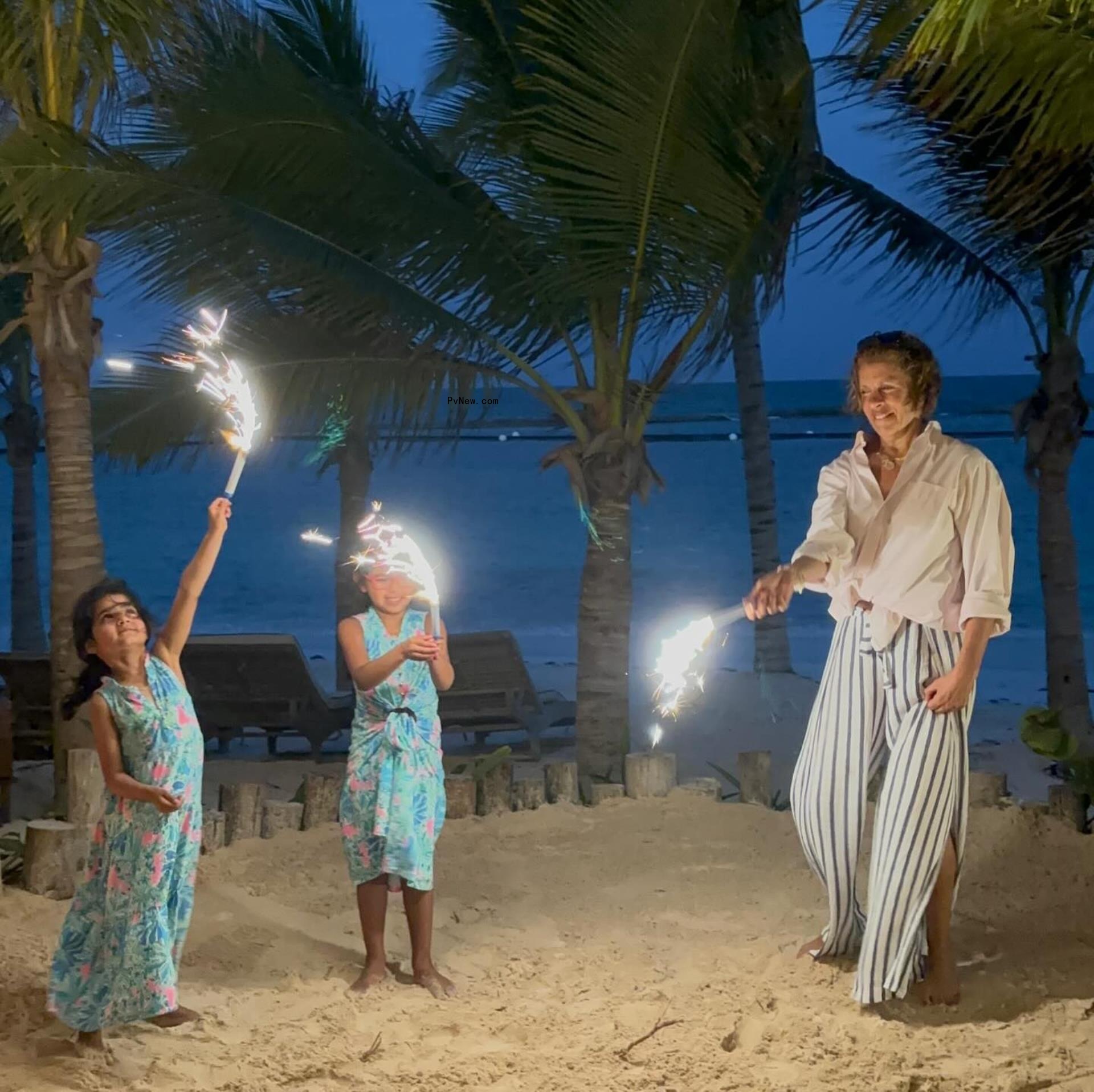 Hoda Kotb and her daughters playing with sparklers