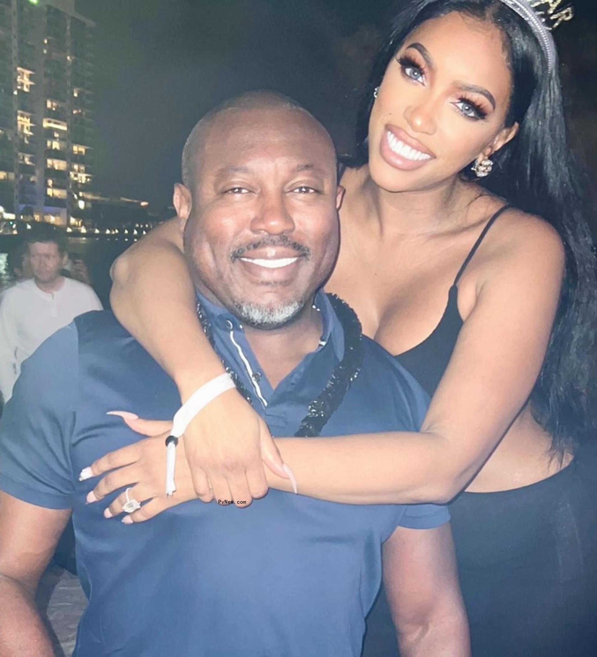 porsha williams with her arms around simon guobadia