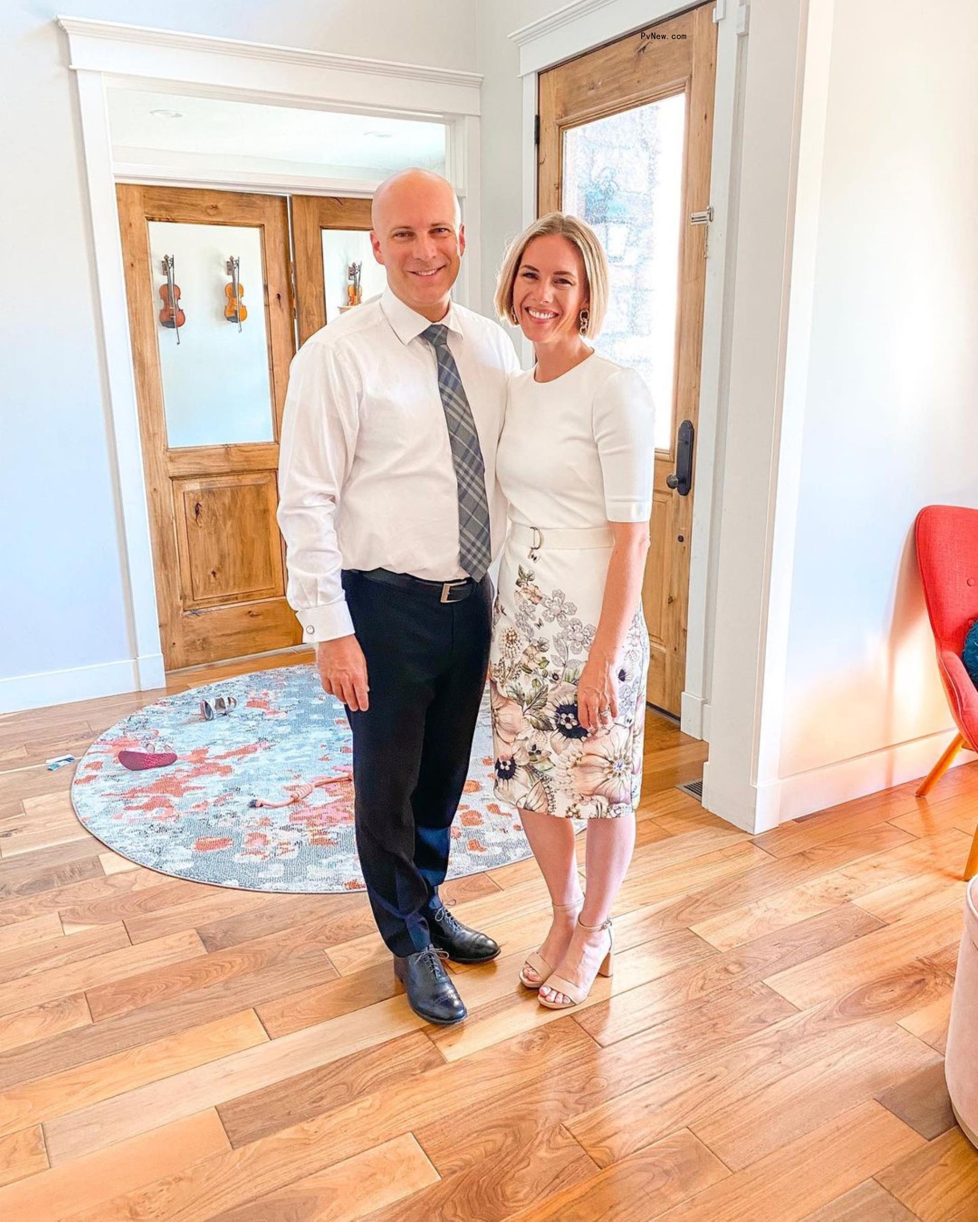 ruby and kevin franke standing in their foyer