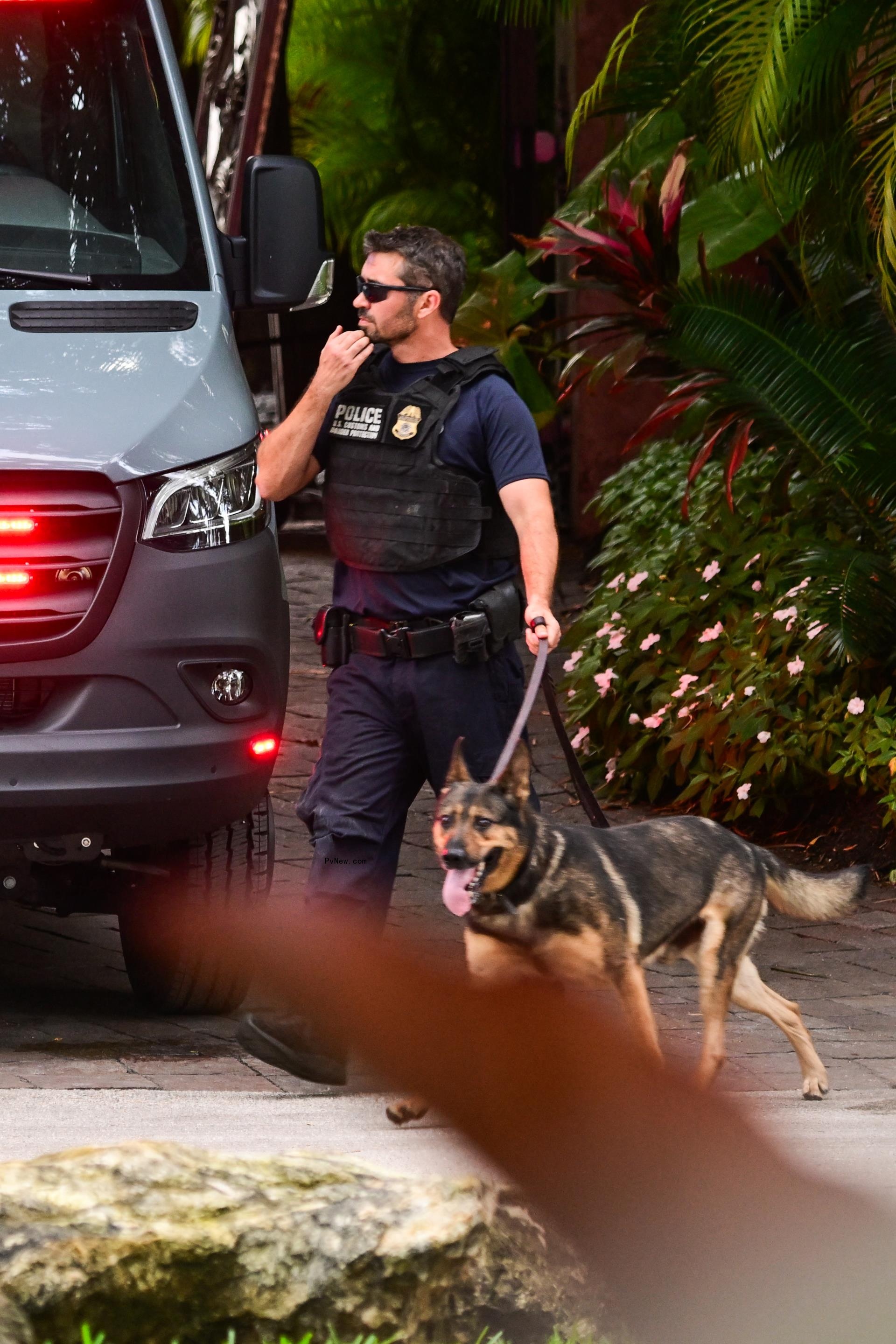 Homeland Security official outside of Diddy's home.