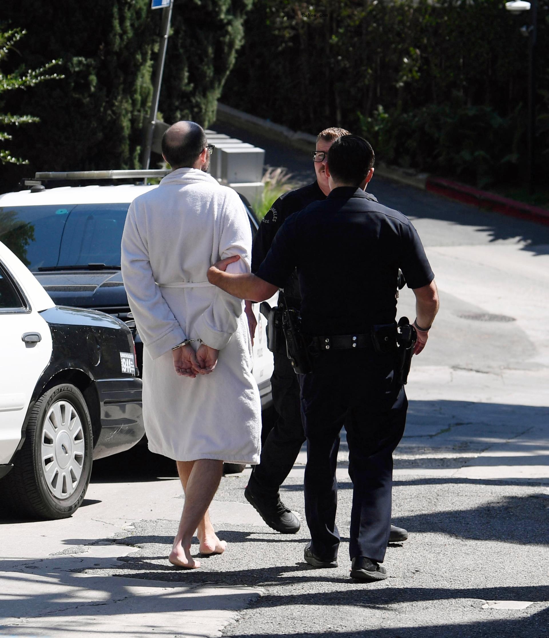 Christian Richard being arrested.