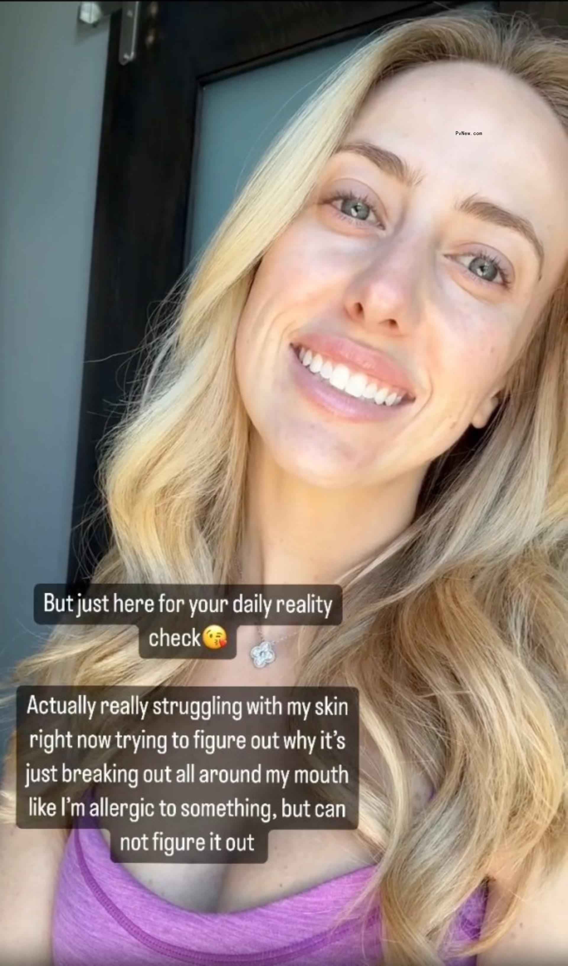 Brittany Mahomes selfie in purple tank.