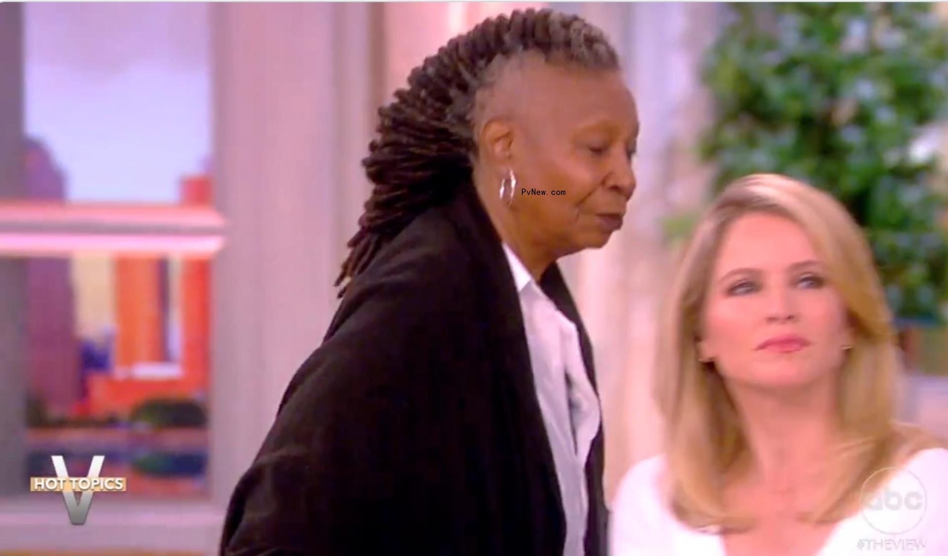 Whoopi Goldberg walking off 