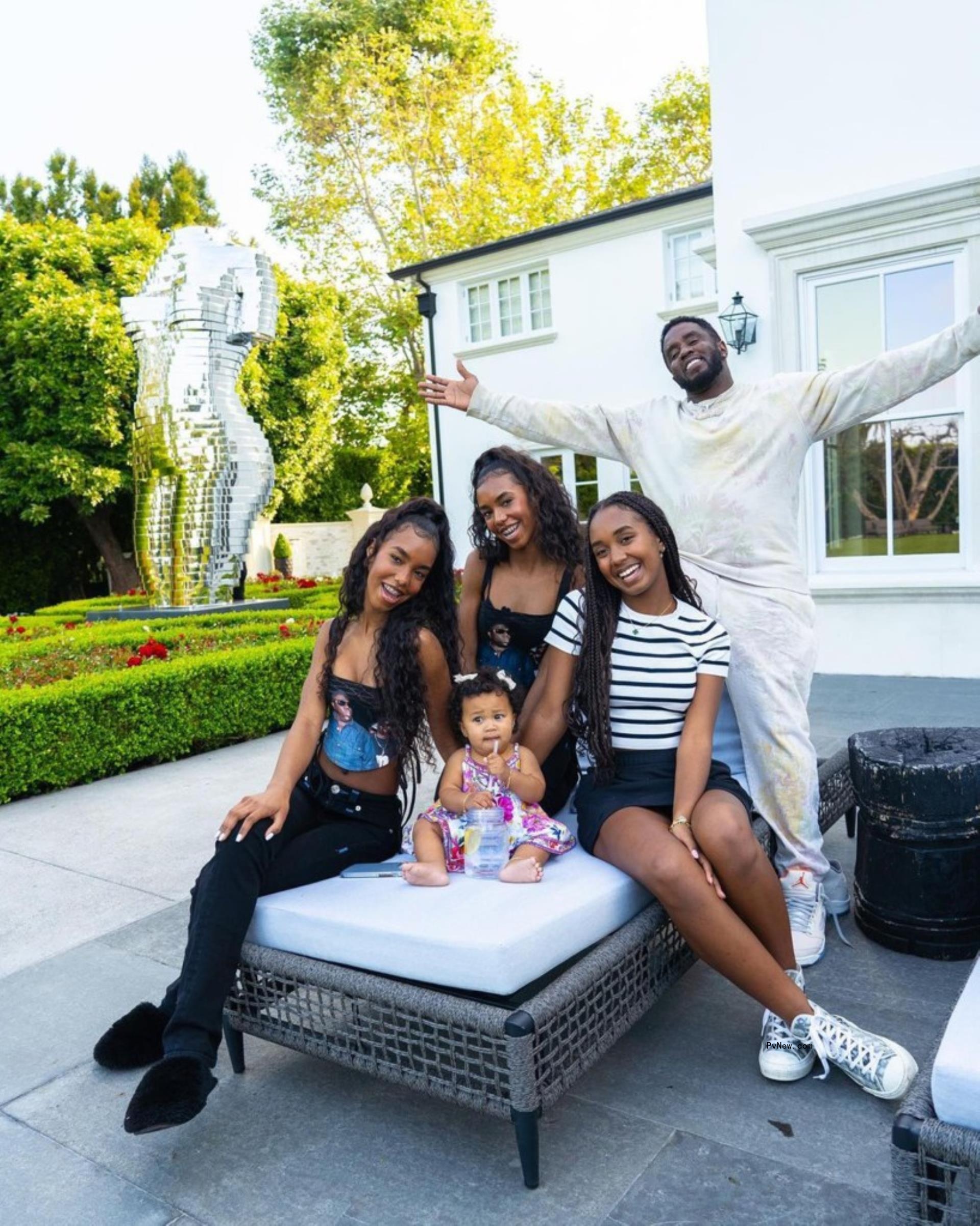 Diddy and his kids in his Los Angeles backyard.