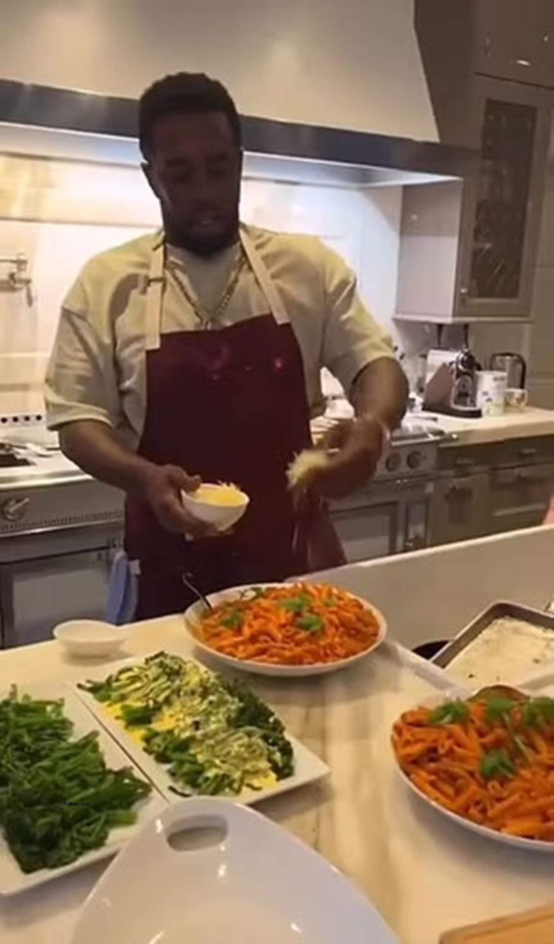 Diddy cooking in his kitchen.