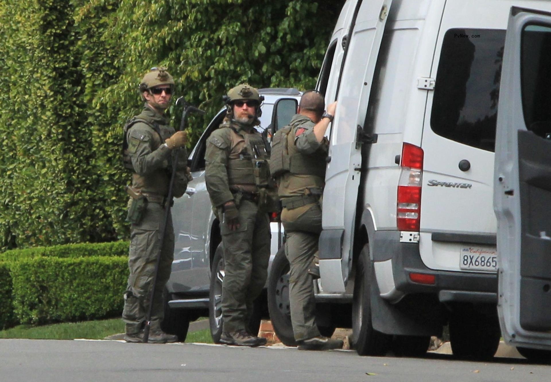 Sean ‘Diddy’ Combs talks with feds at airport as alleged drug mule is arrested in new photo