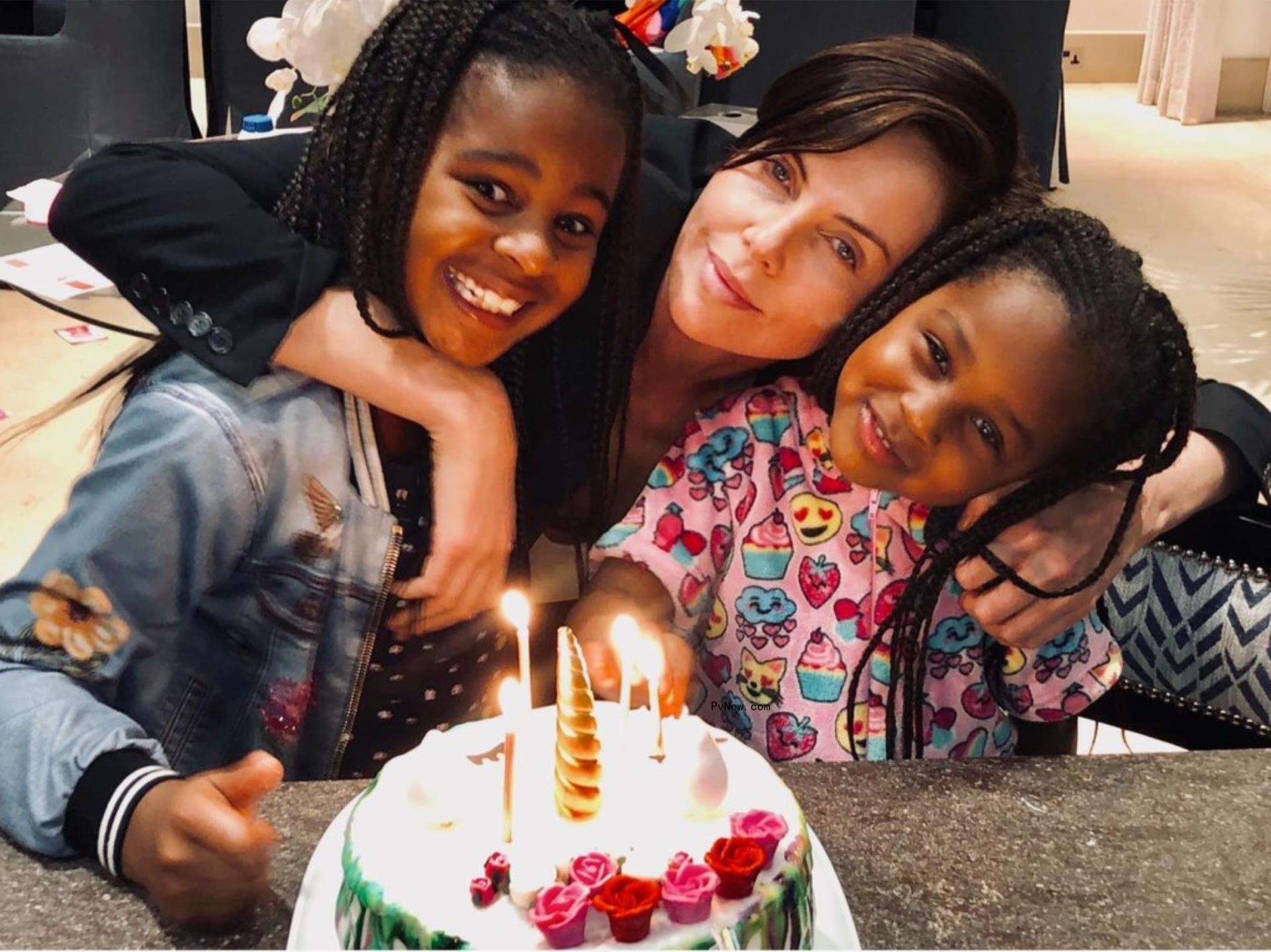 Charlize Theron with her daughters