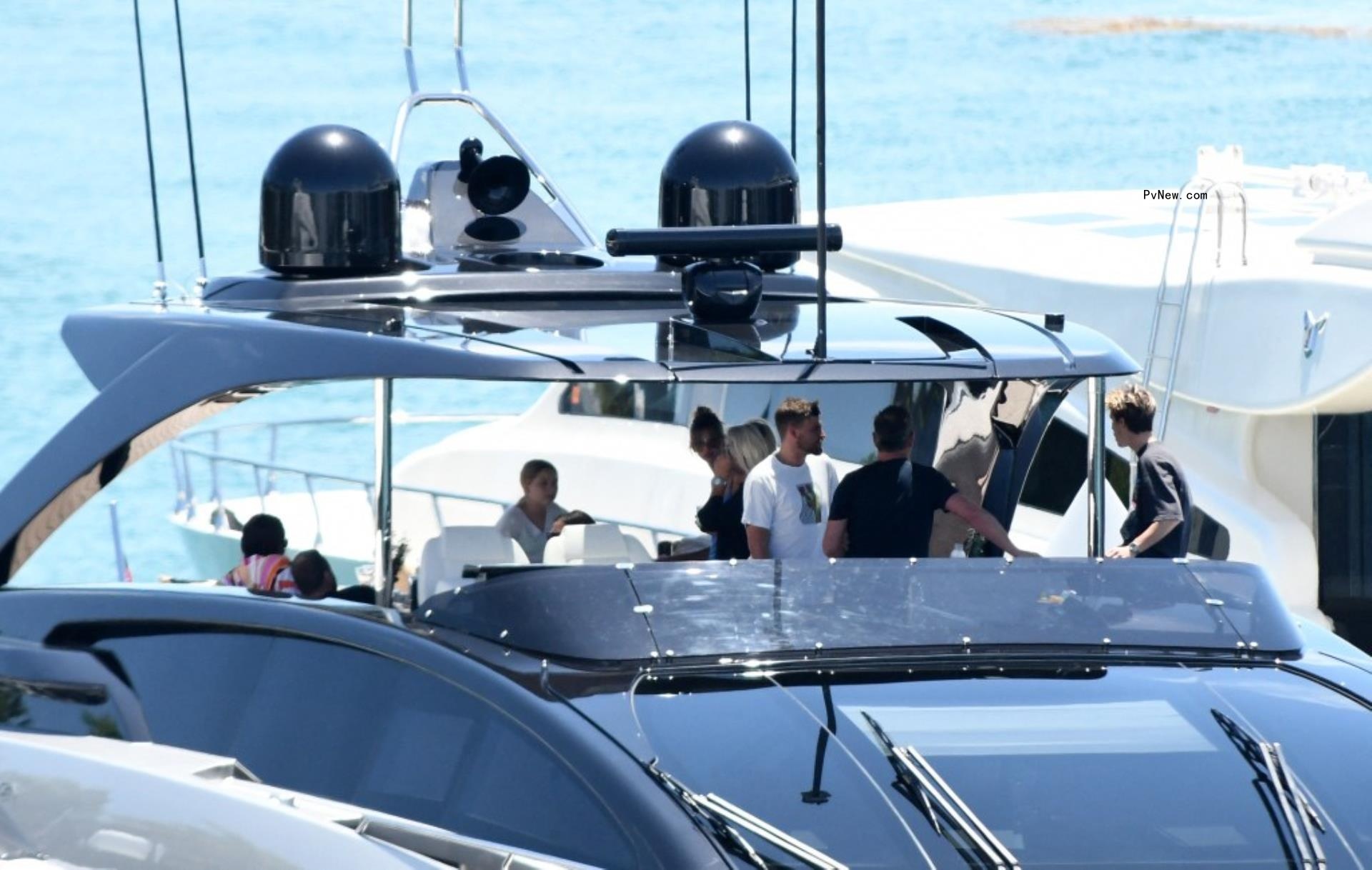 David Beckham and Victoria Beckham host their family and friends on their yacht.