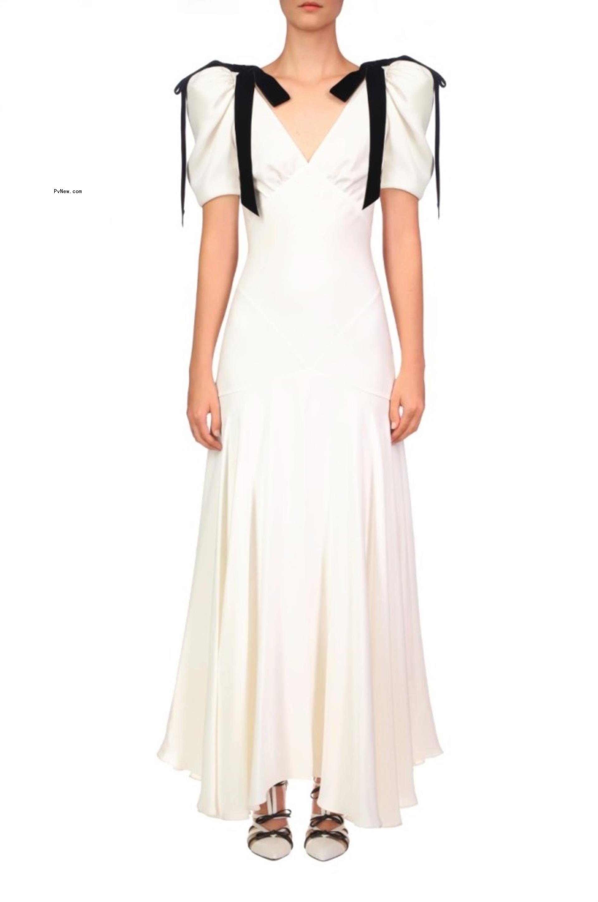 Rodarte white gown with black velvet ribbons hanging from shoulders.
